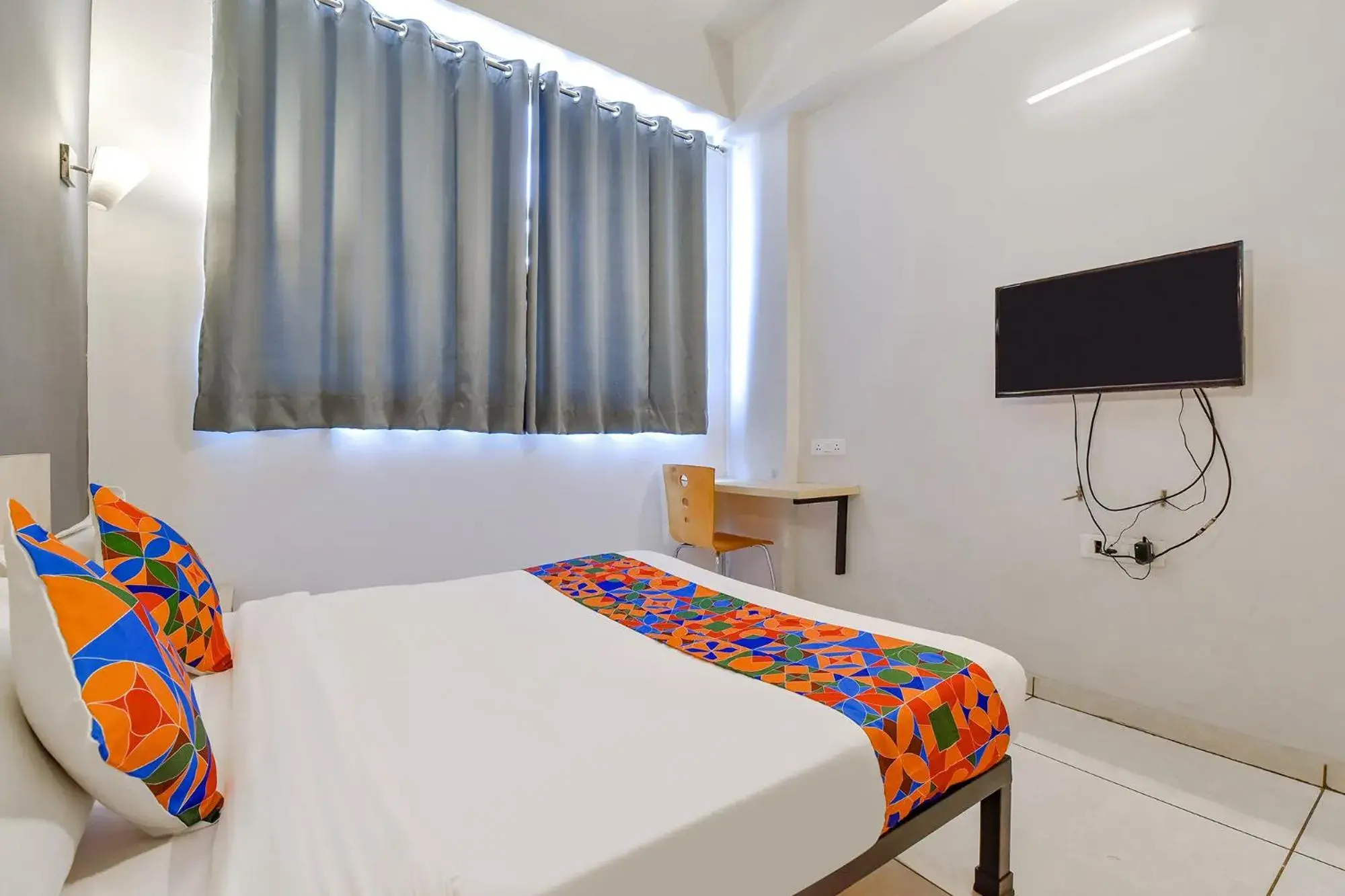 Communal lounge/ TV room, Bed in FabHotel Kaviya - Bopal Communal lounge/ TV room, Bed in FabHotel Kaviya - Bopal