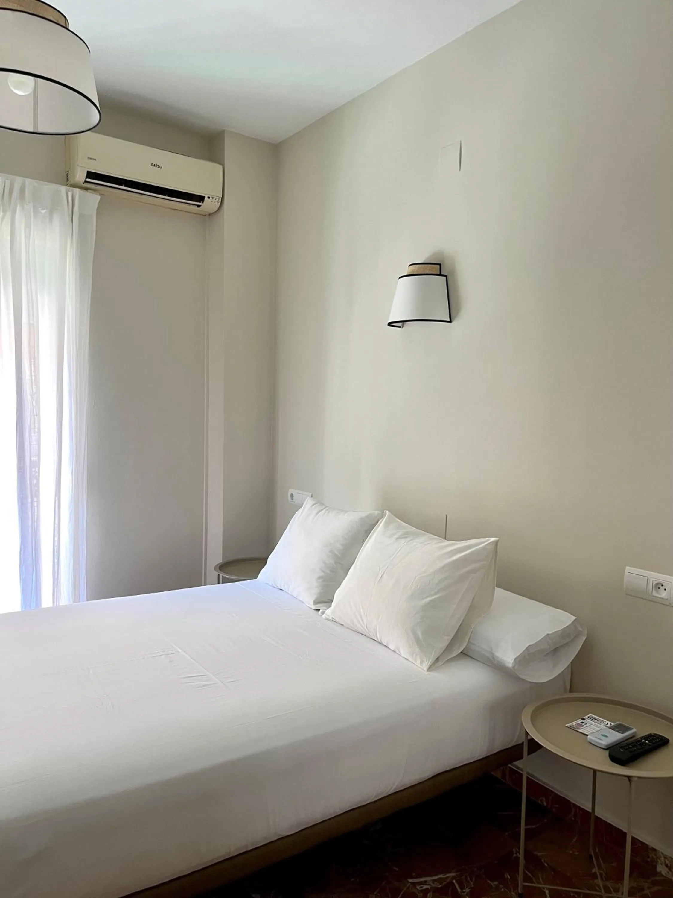 Bed in La Vega Rooms