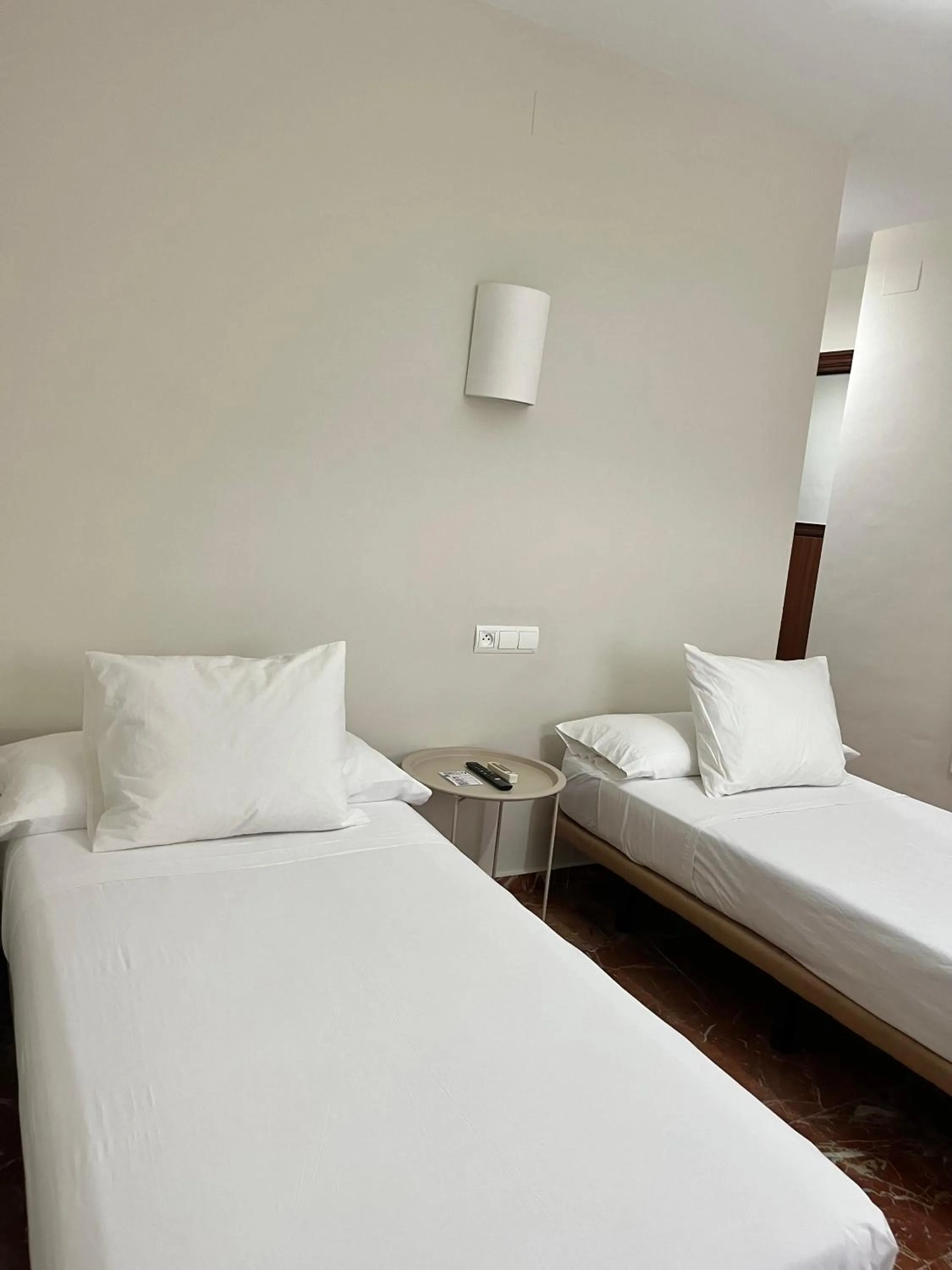 Bed in La Vega Rooms