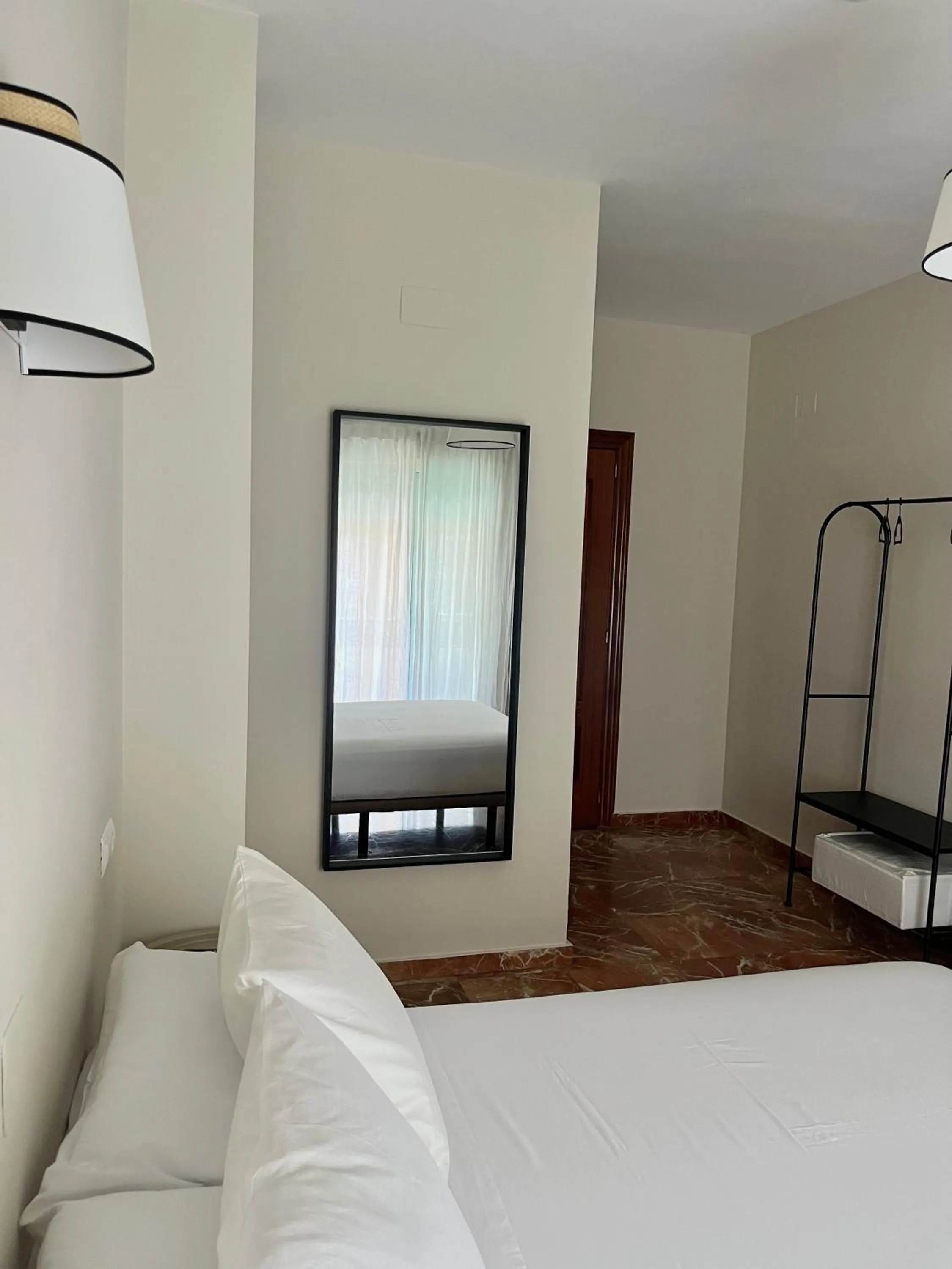 Bed in La Vega Rooms