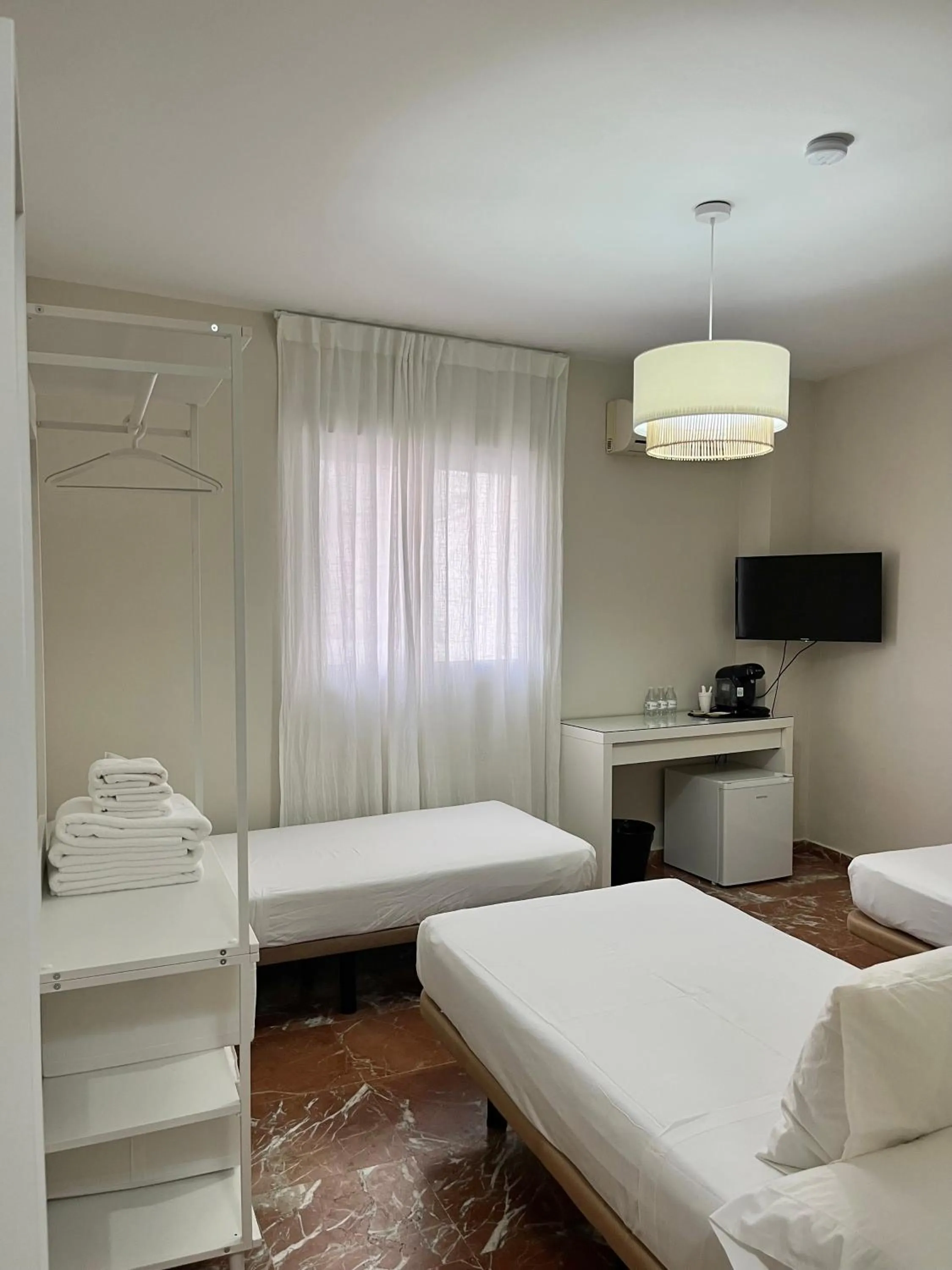 Bed in La Vega Rooms