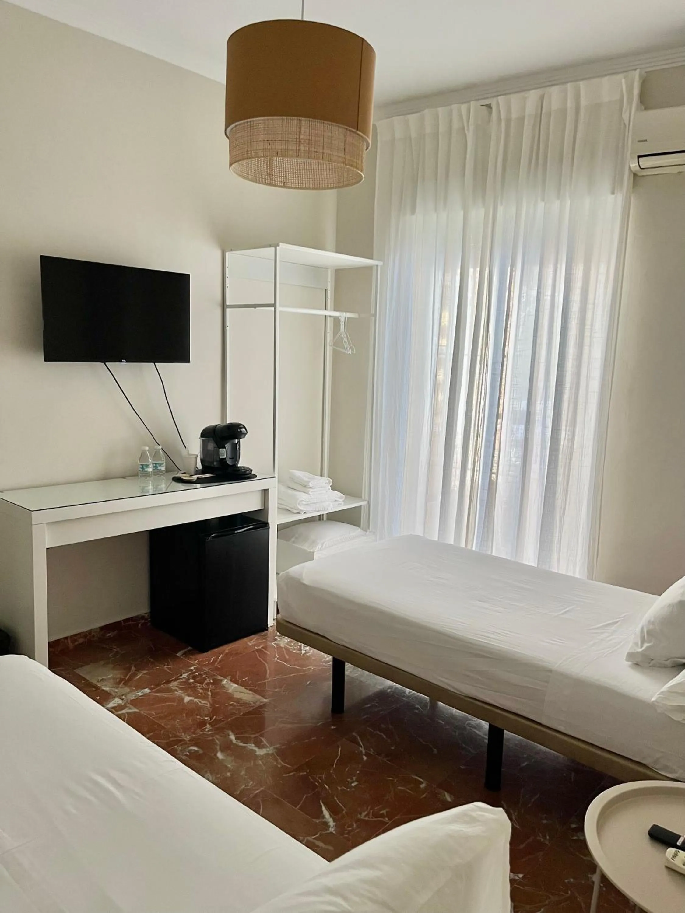 Bed in La Vega Rooms