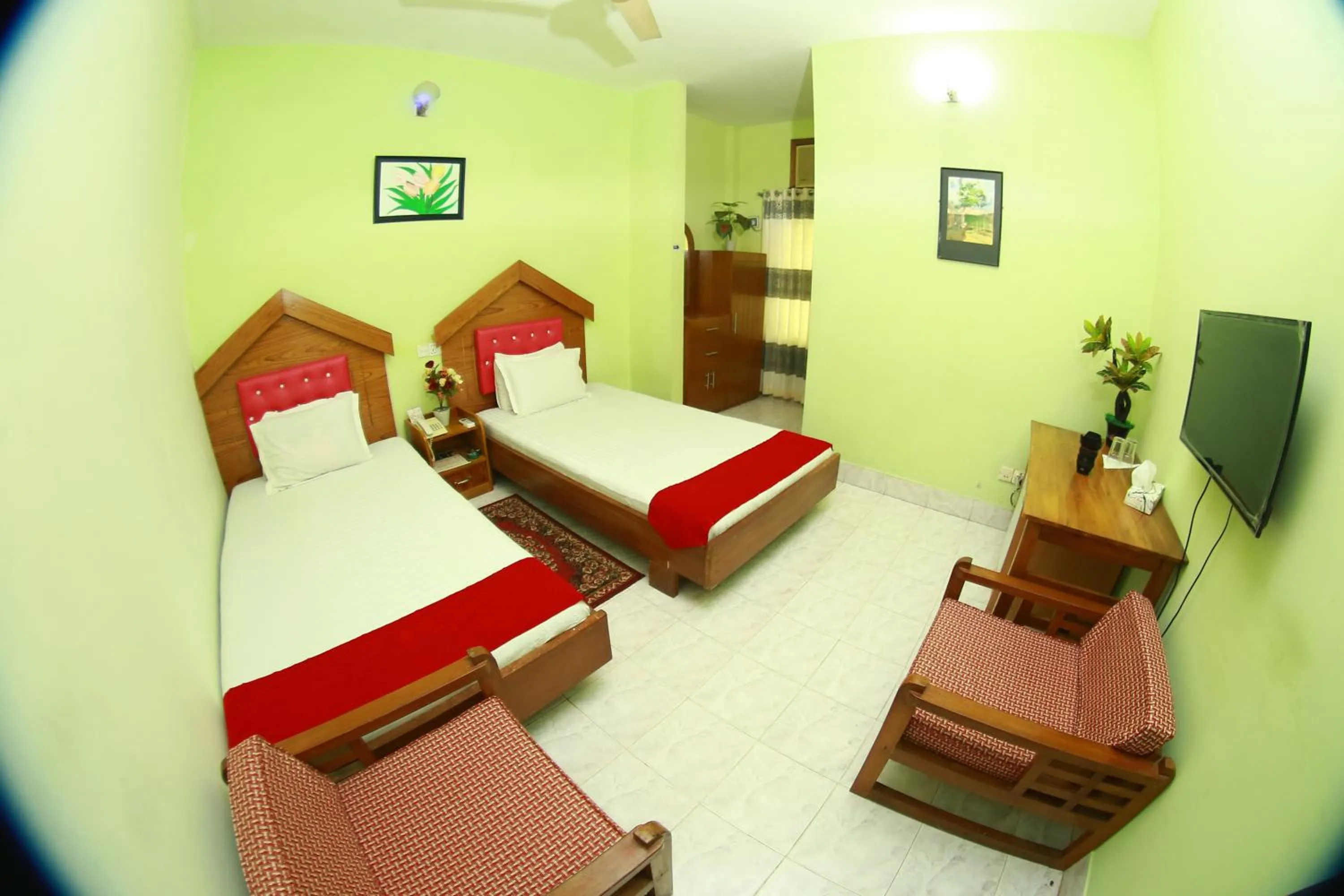 Living room, Bed in Hotel Farmis Garden