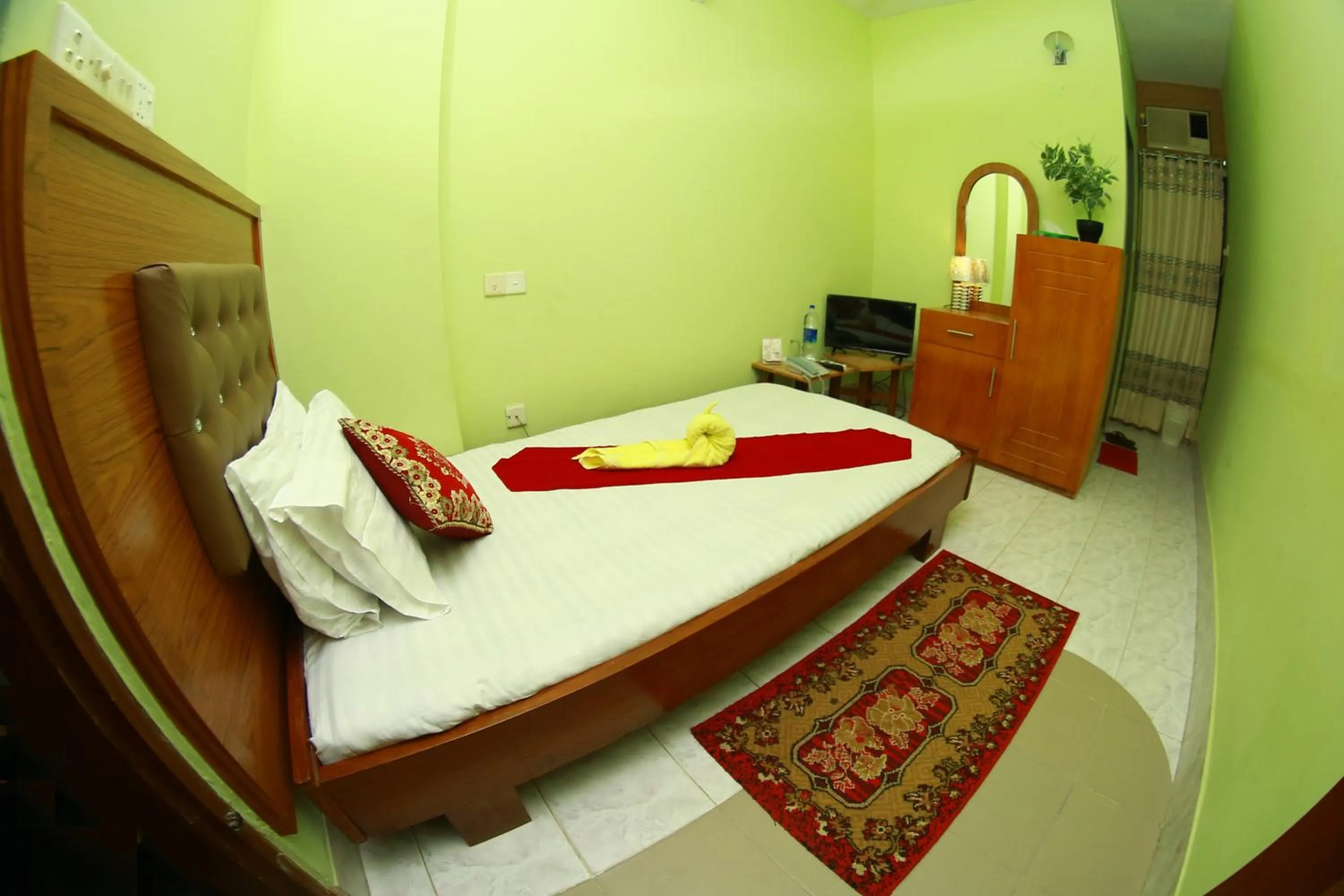 Bed in Hotel Farmis Garden