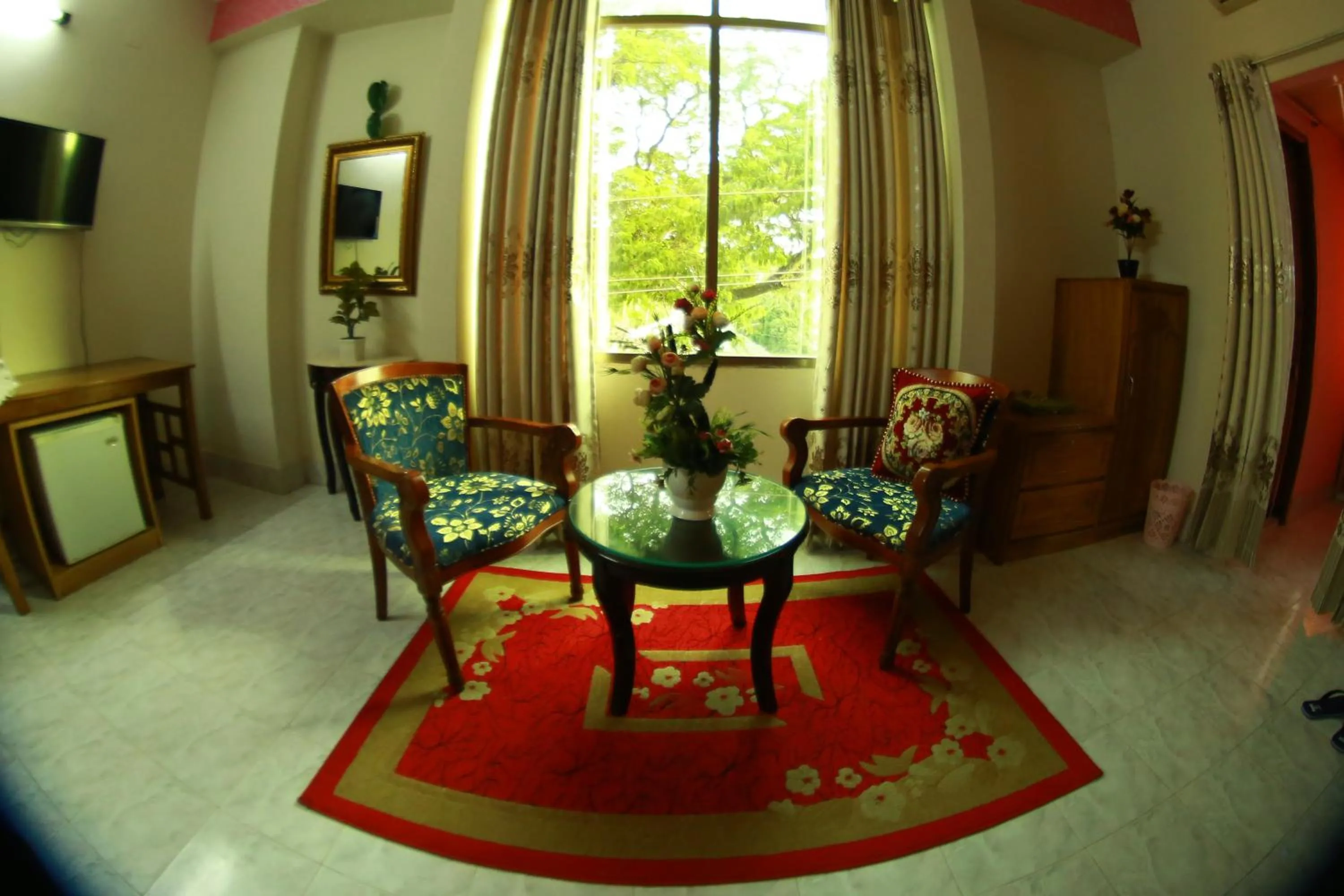Seating area in Hotel Farmis Garden