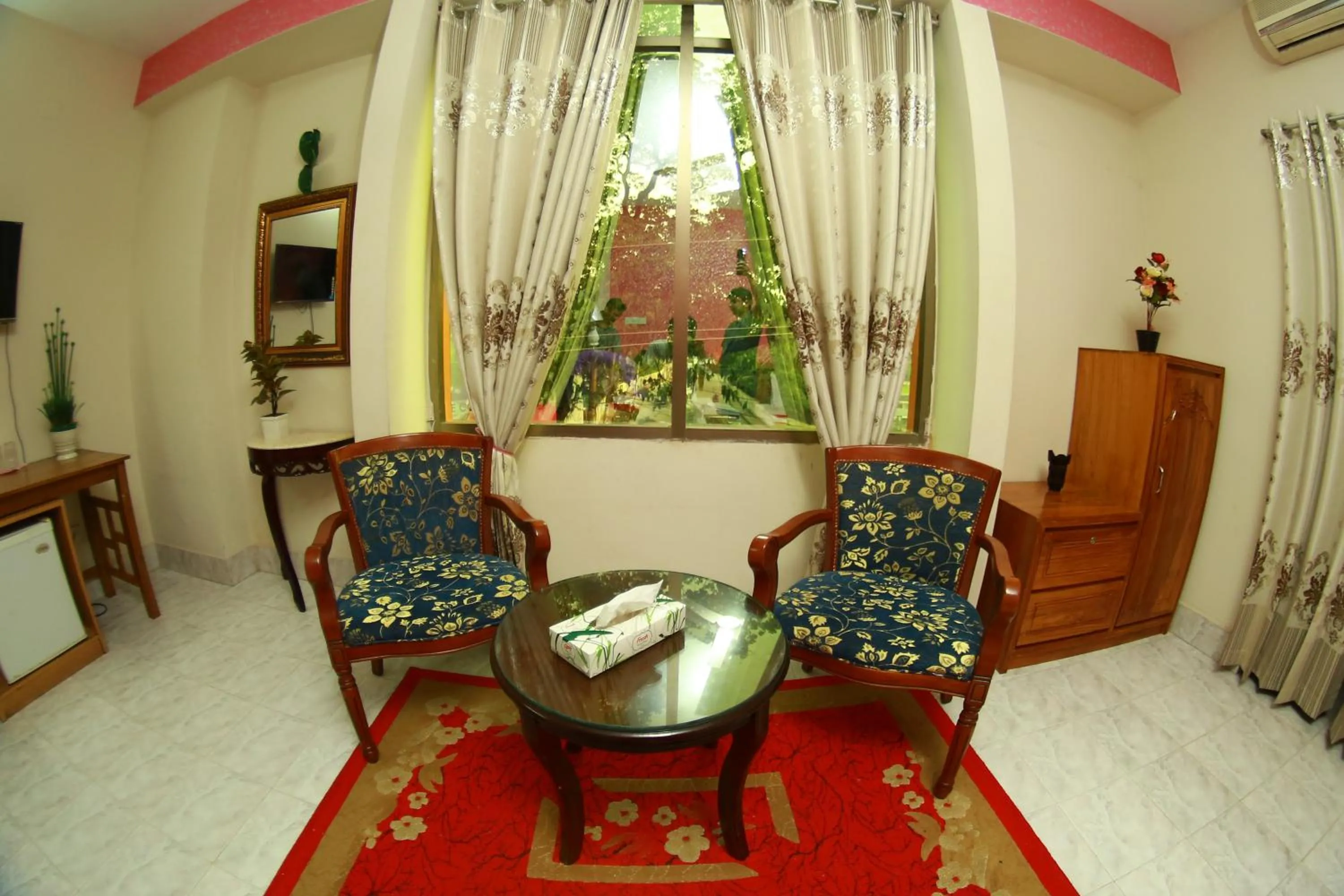 Seating area in Hotel Farmis Garden