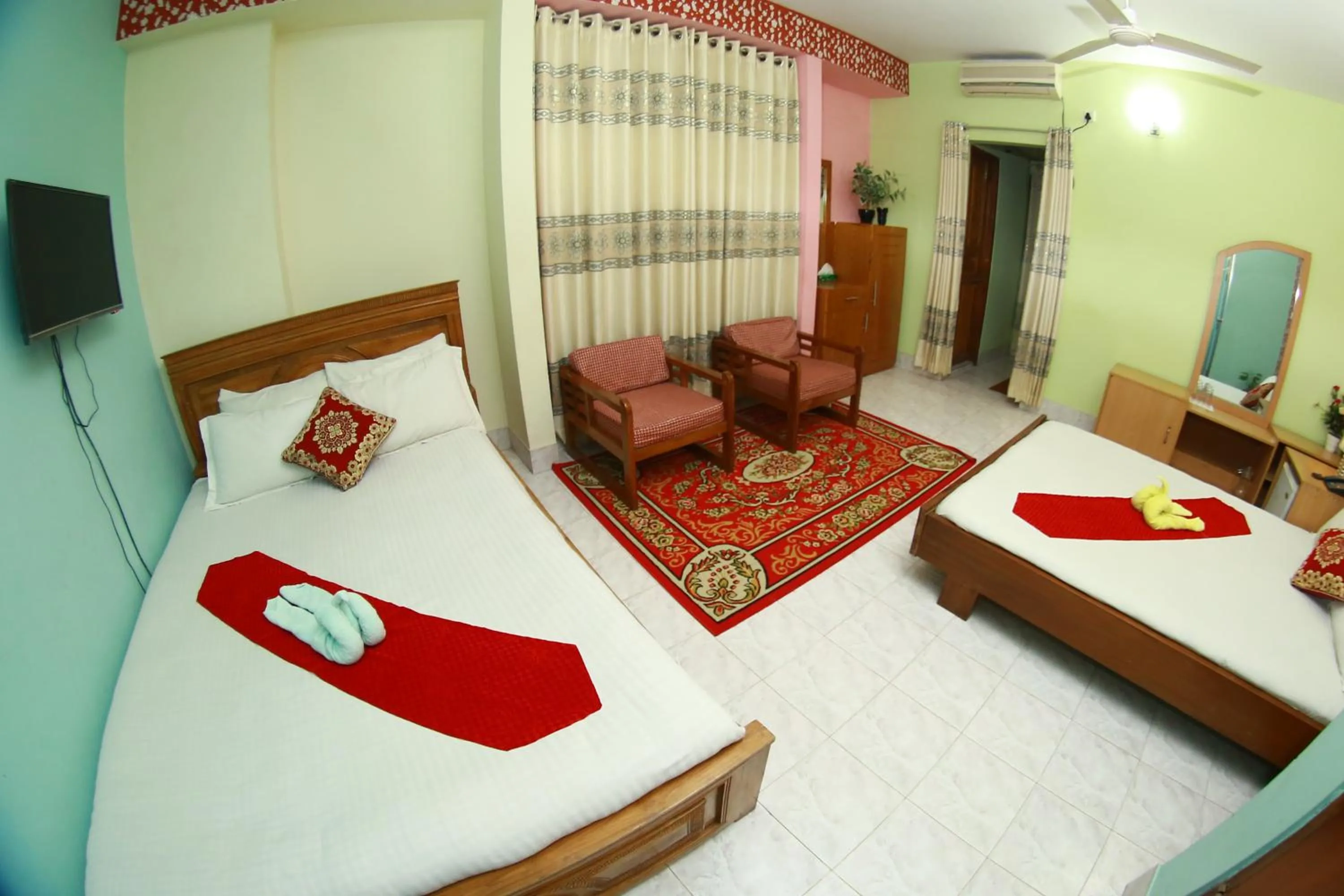 Living room, Bed in Hotel Farmis Garden