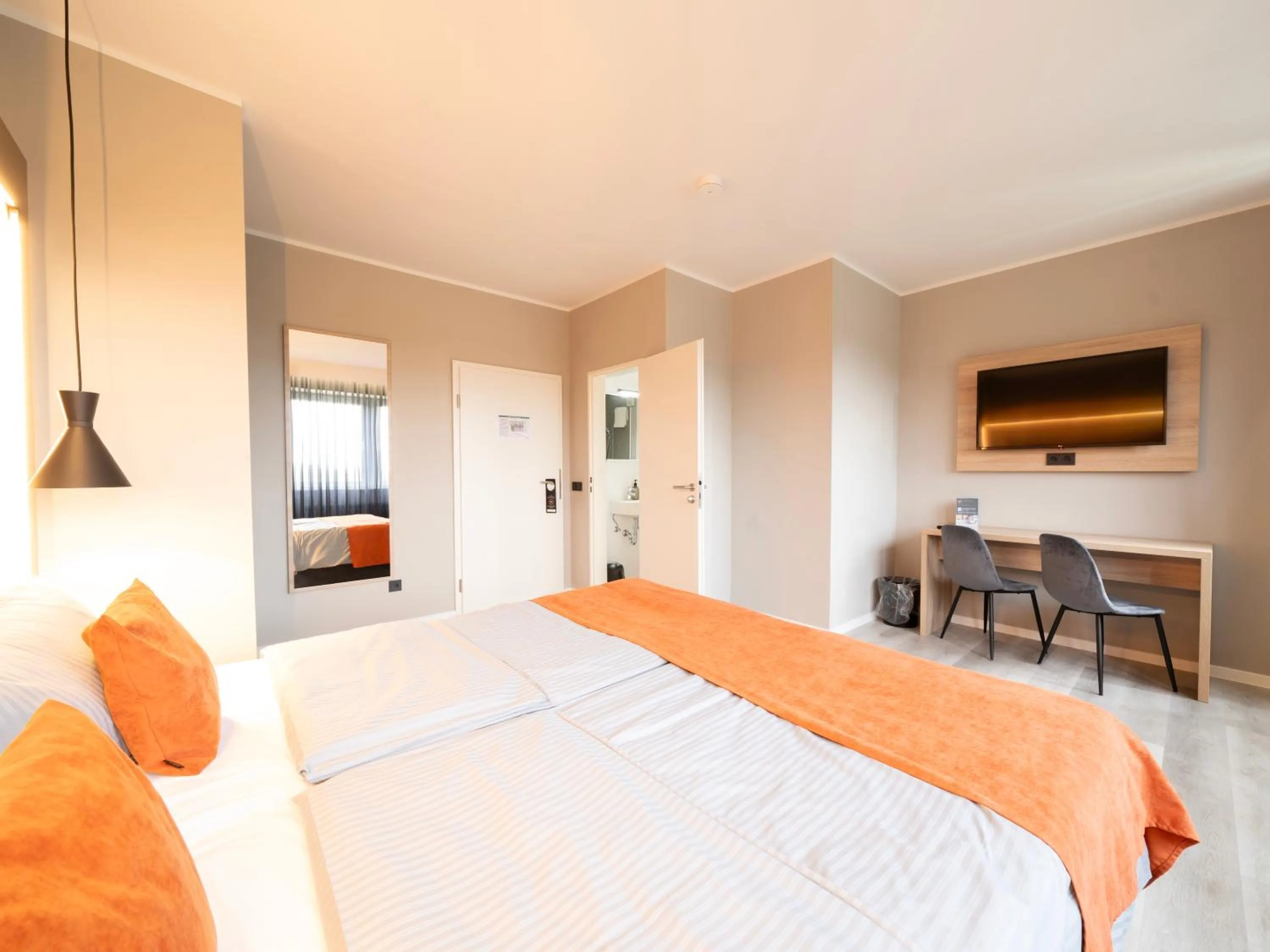 Bed in JustStay Mülheim Hotel & Apartments