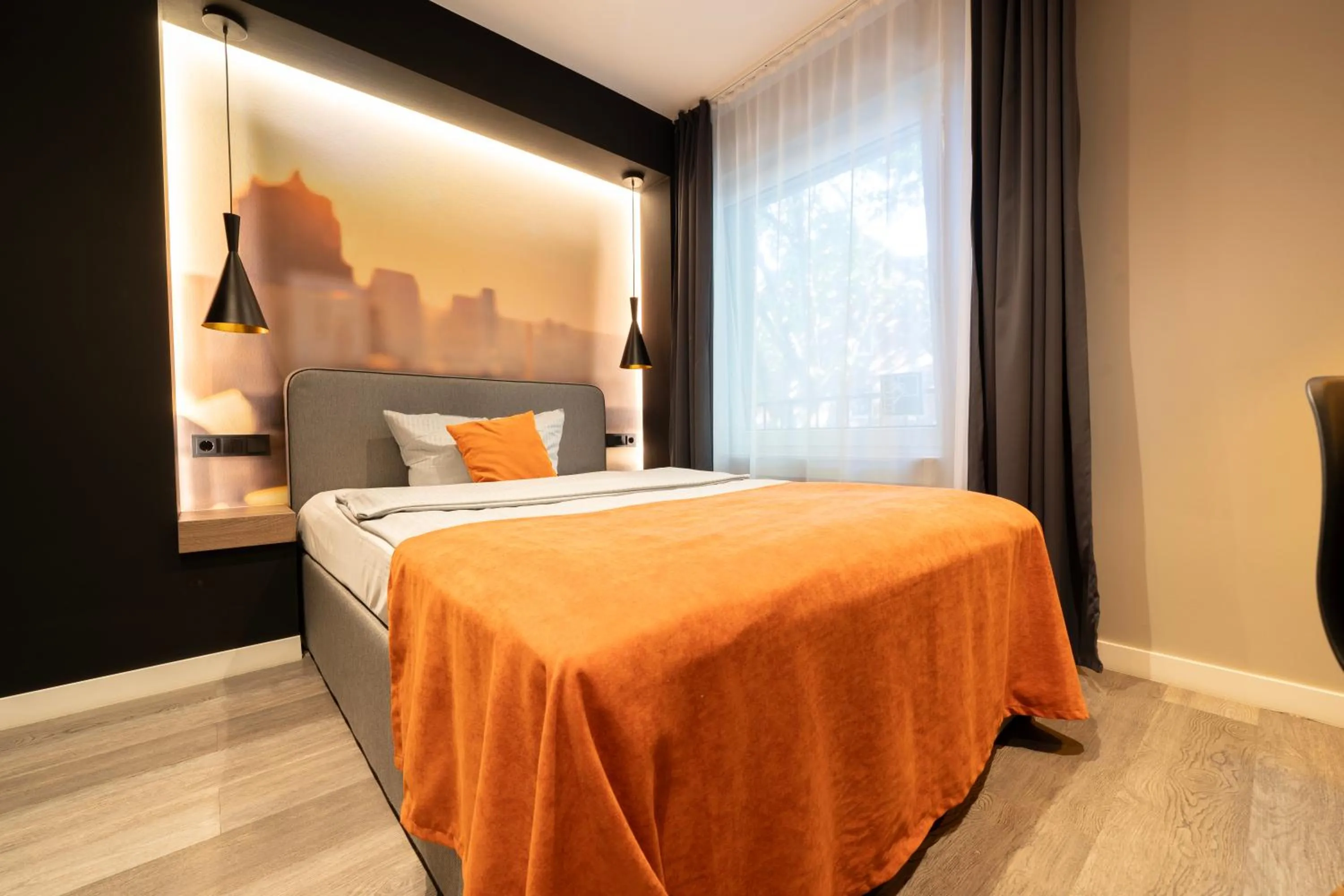 Bedroom, Bed in JustStay Mülheim Hotel & Apartments