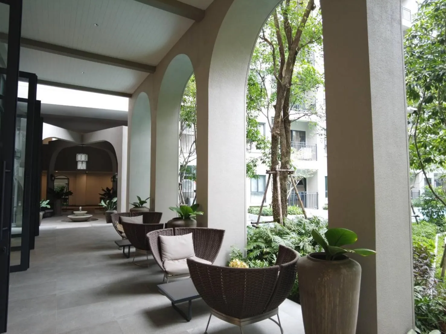 Communal lounge/ TV room in La Casita Hua Hin by Holiyay