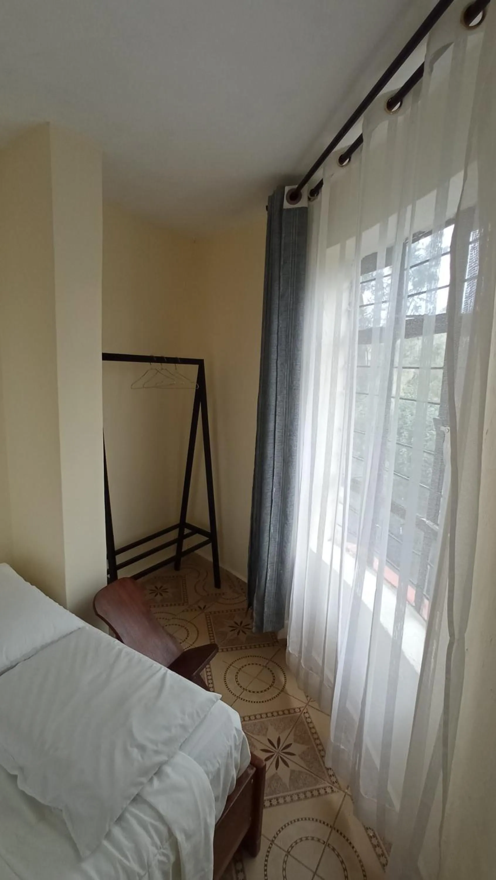 wardrobe, Bed in Lago Resort - Best Views in Kisumu