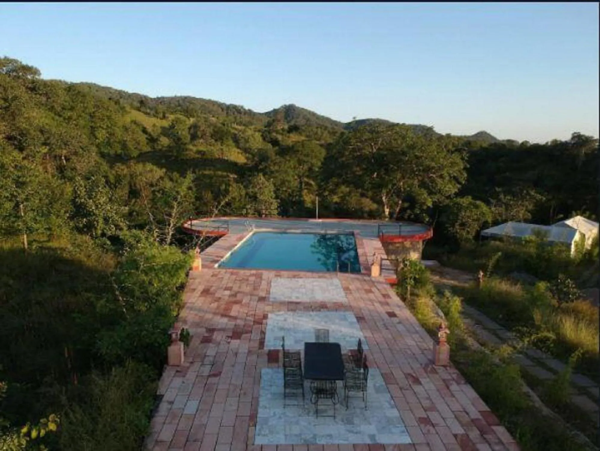 Swimming pool in The Sky Imperial Jungle Camp Resort