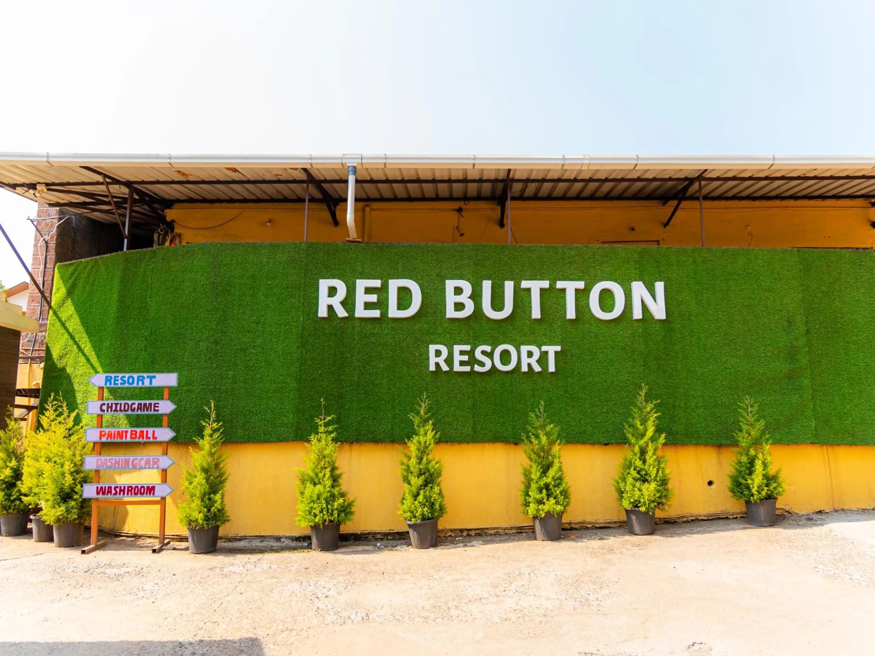 Property logo or sign in Red Button Resort