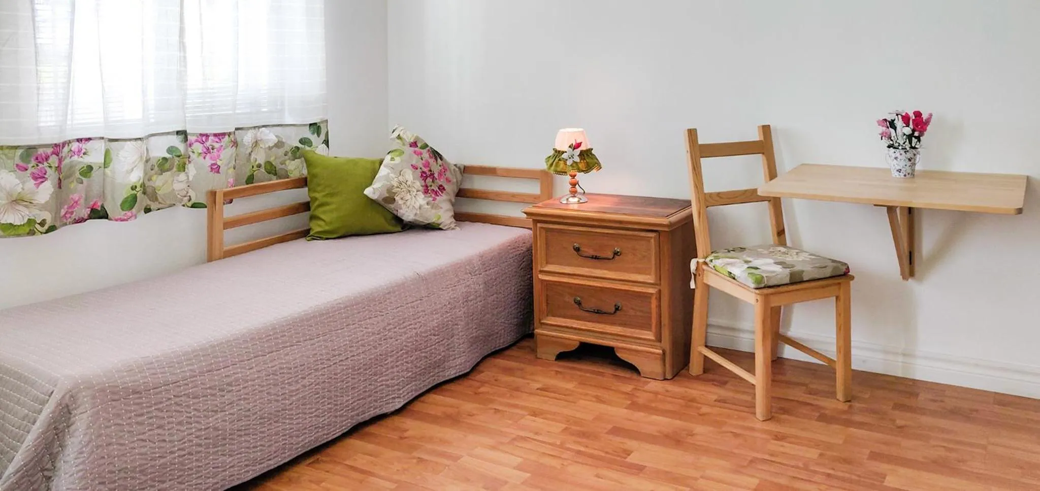 Seating area, Bed in Rainbow Guest House