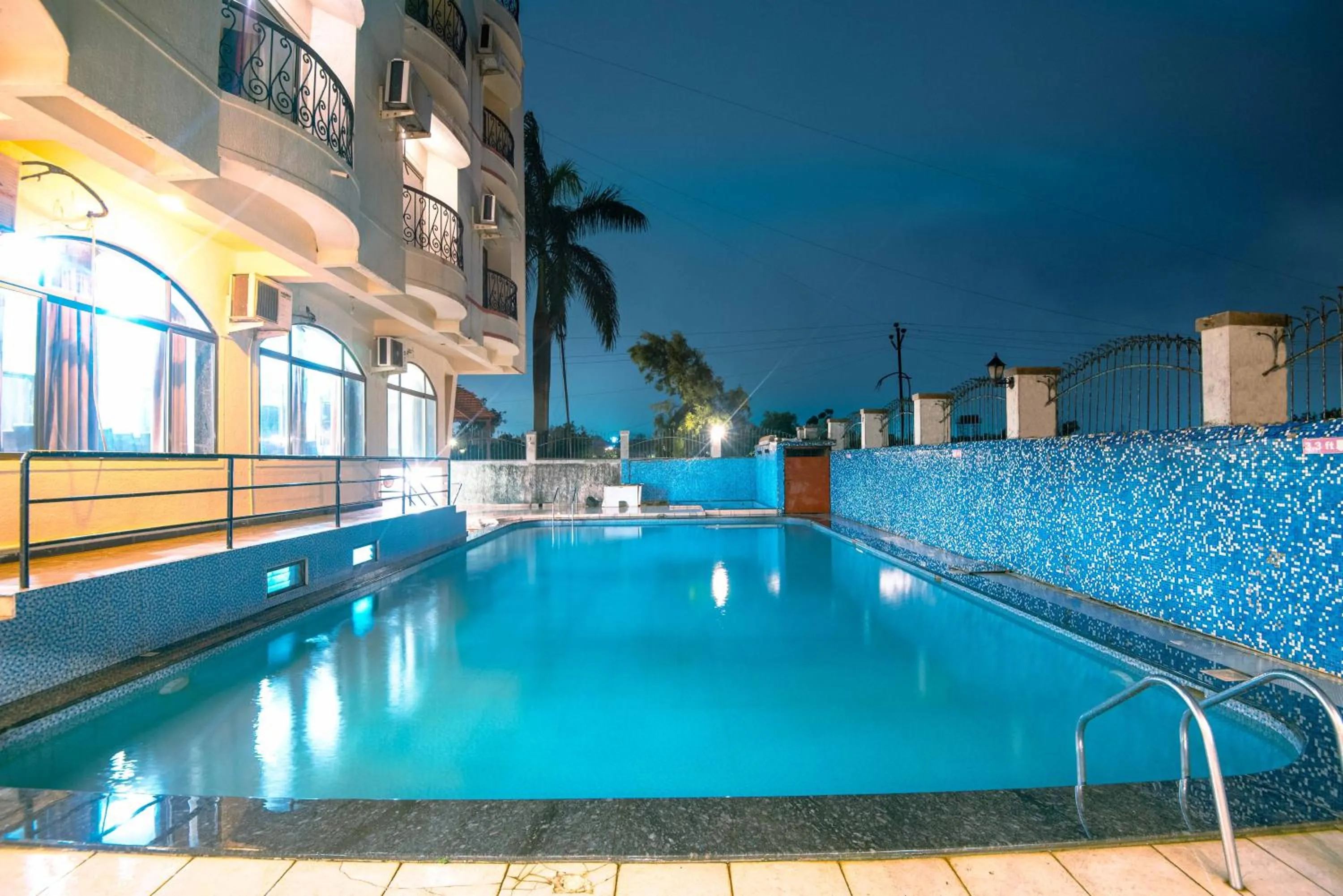 Swimming pool in Treebo Reveniir Resort with Pool