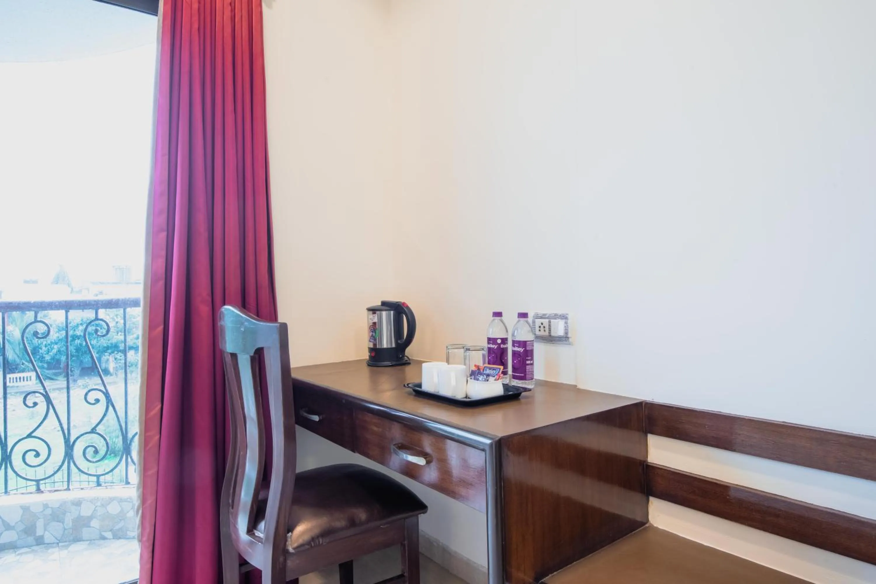 Bedroom in Treebo Reveniir Resort with Pool