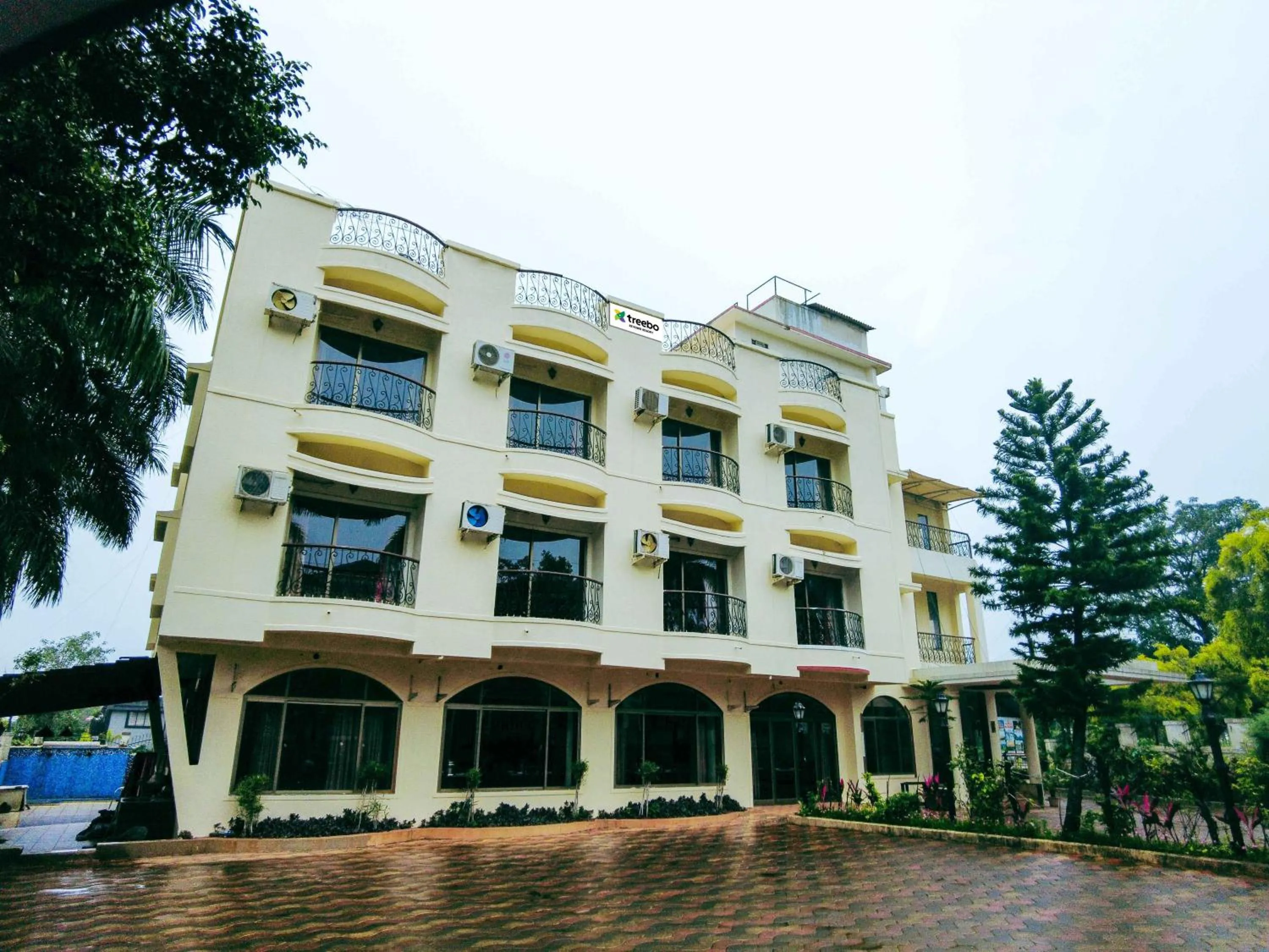 Property building in Treebo Reveniir Resort with Pool