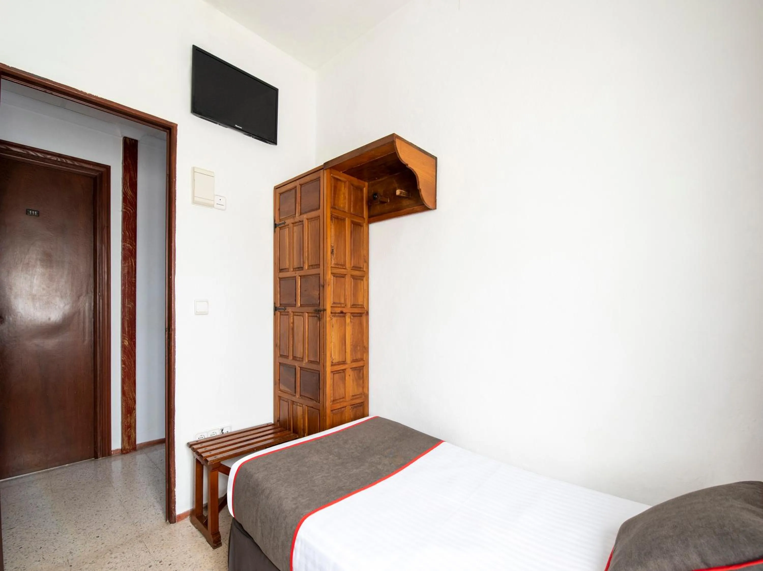 Bed in Hostal Santiago