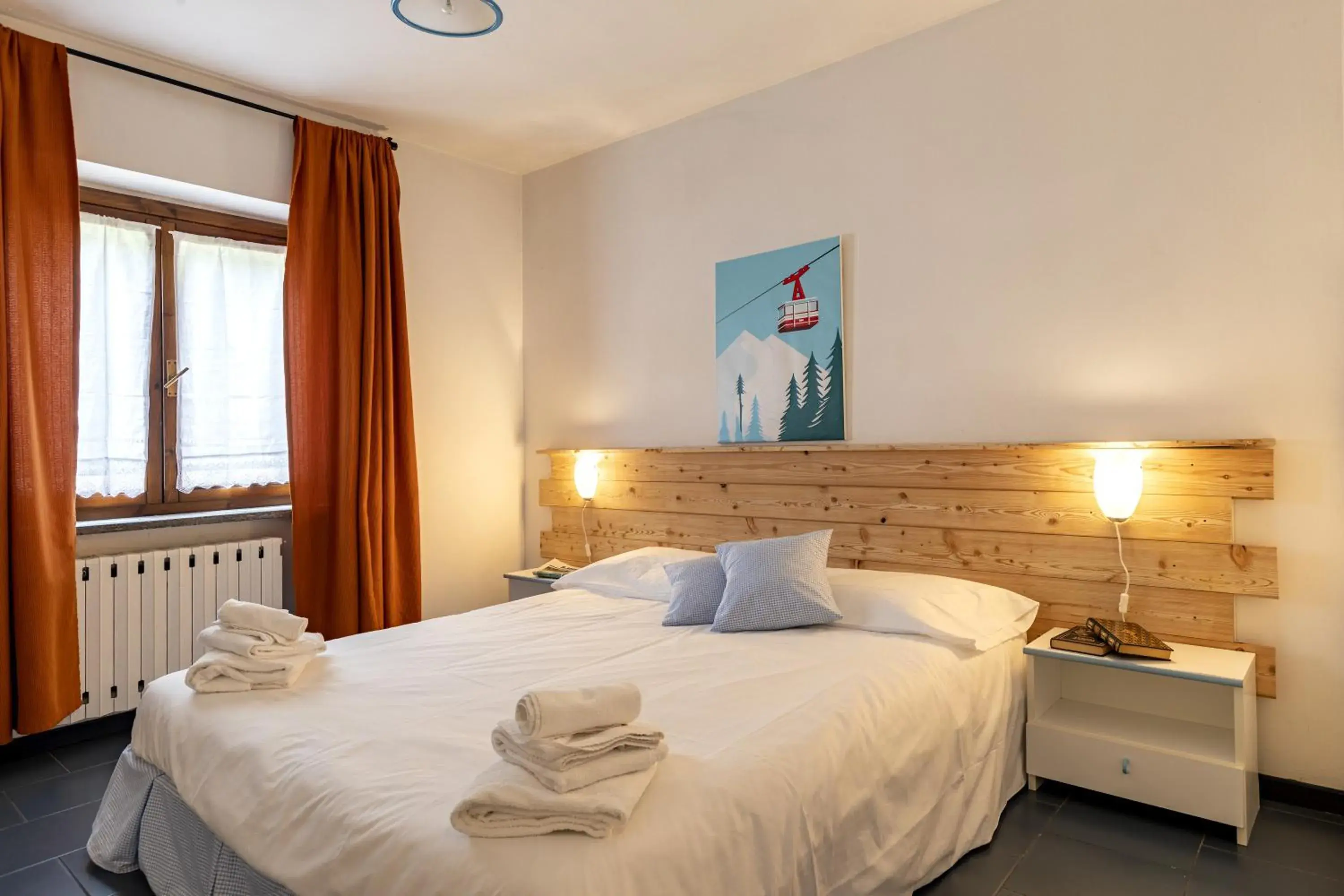 Bed in Aparthotel Claviere Bed in Aparthotel Claviere