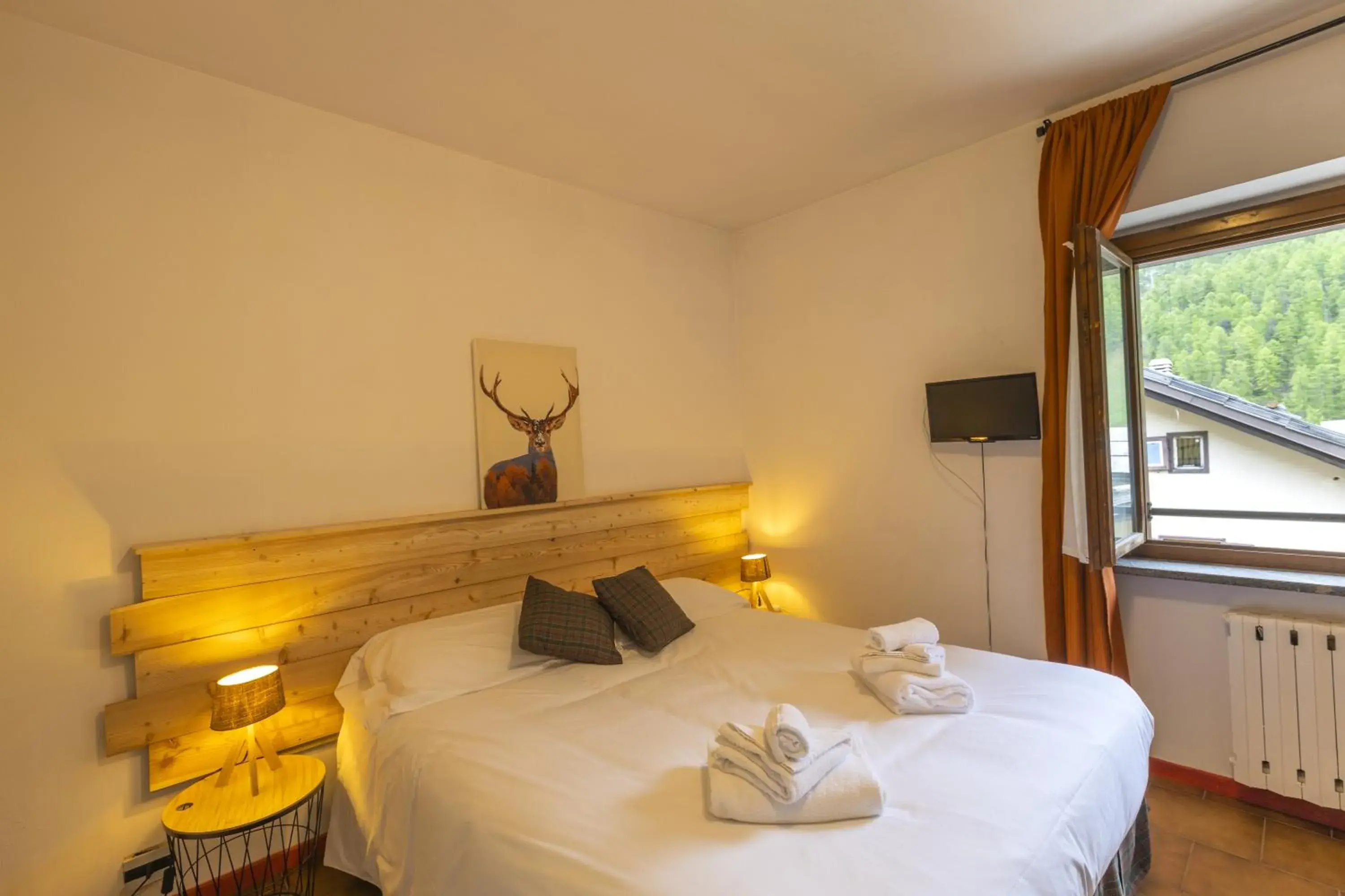 Bedroom, Bed in Aparthotel Claviere Bedroom, Bed in Aparthotel Claviere