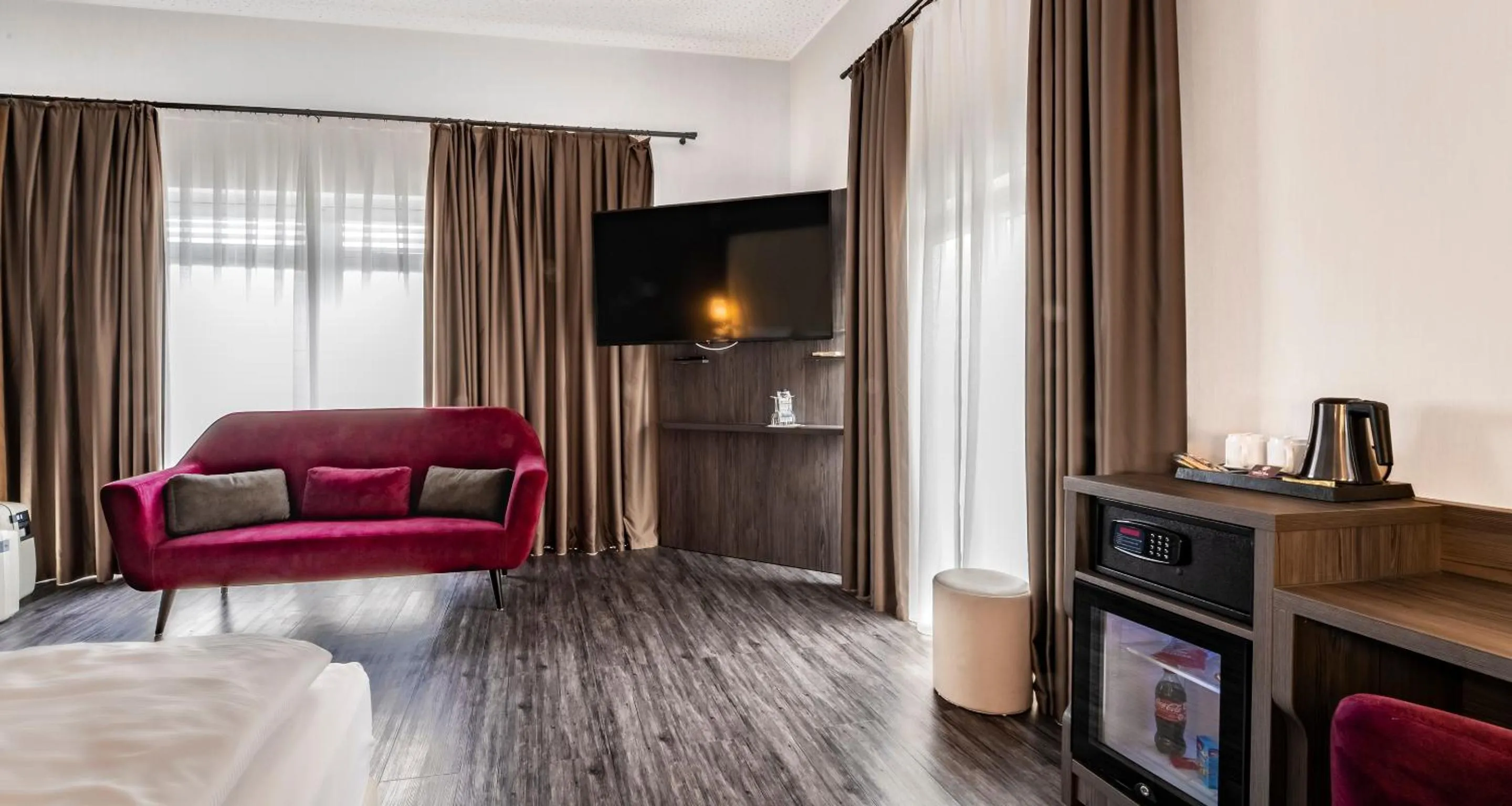 TV and multimedia, Bed in PLAZA INN Heilbronn