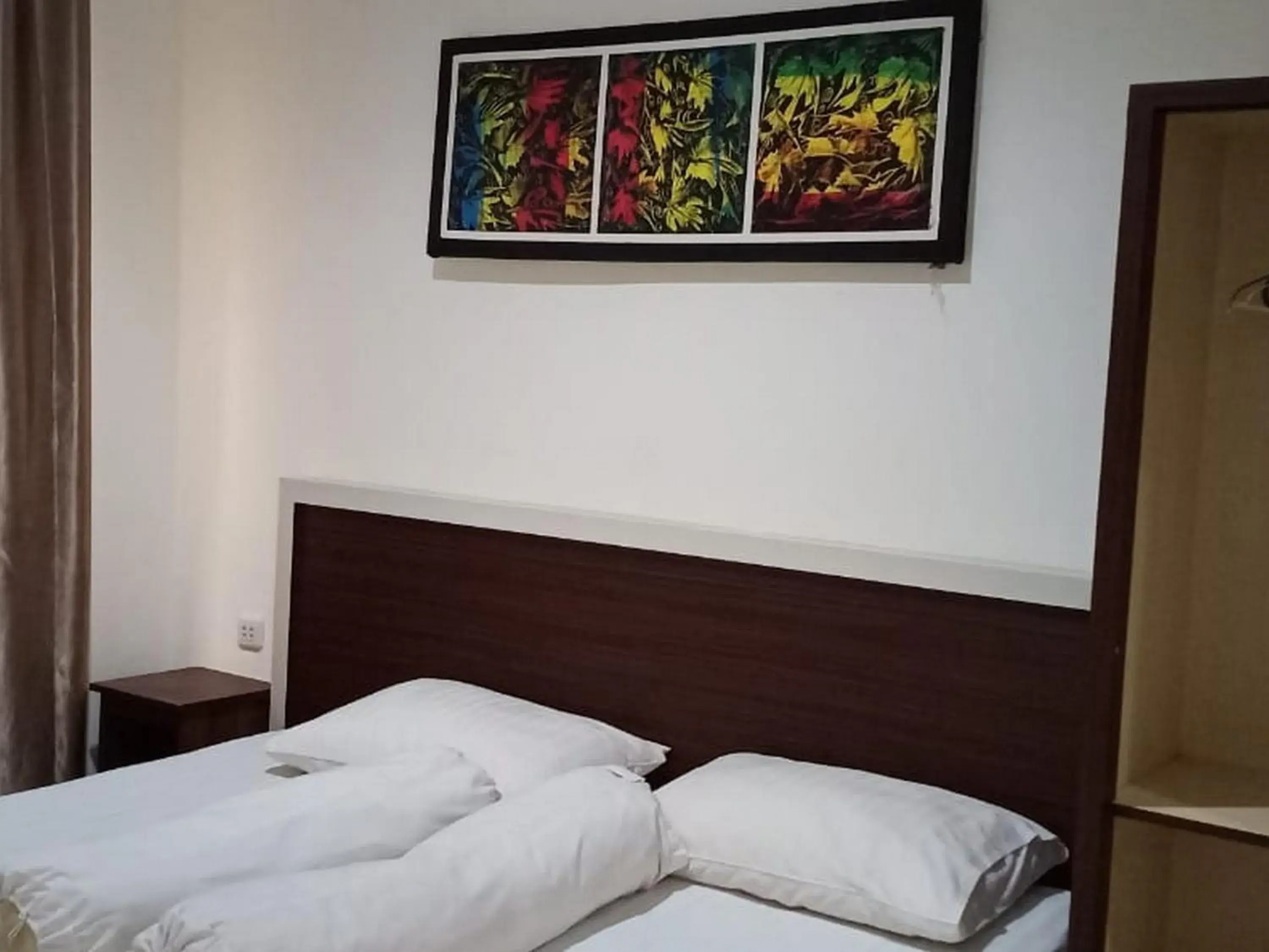 Bed in Fidelia Homestay Palu Mitra RedDoorz Bed in Fidelia Homestay Palu Mitra RedDoorz