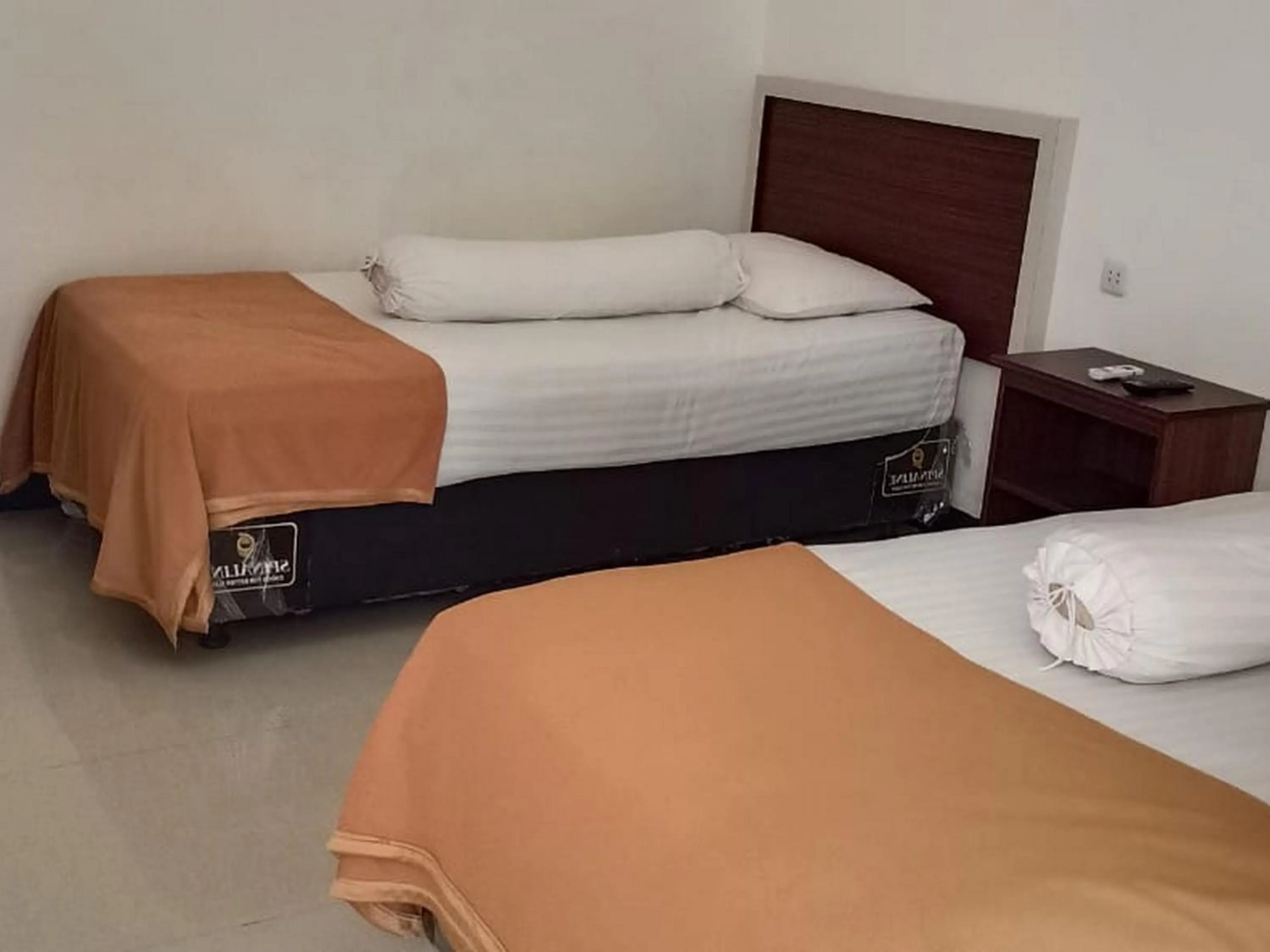 Bed in Fidelia Homestay Palu Mitra RedDoorz