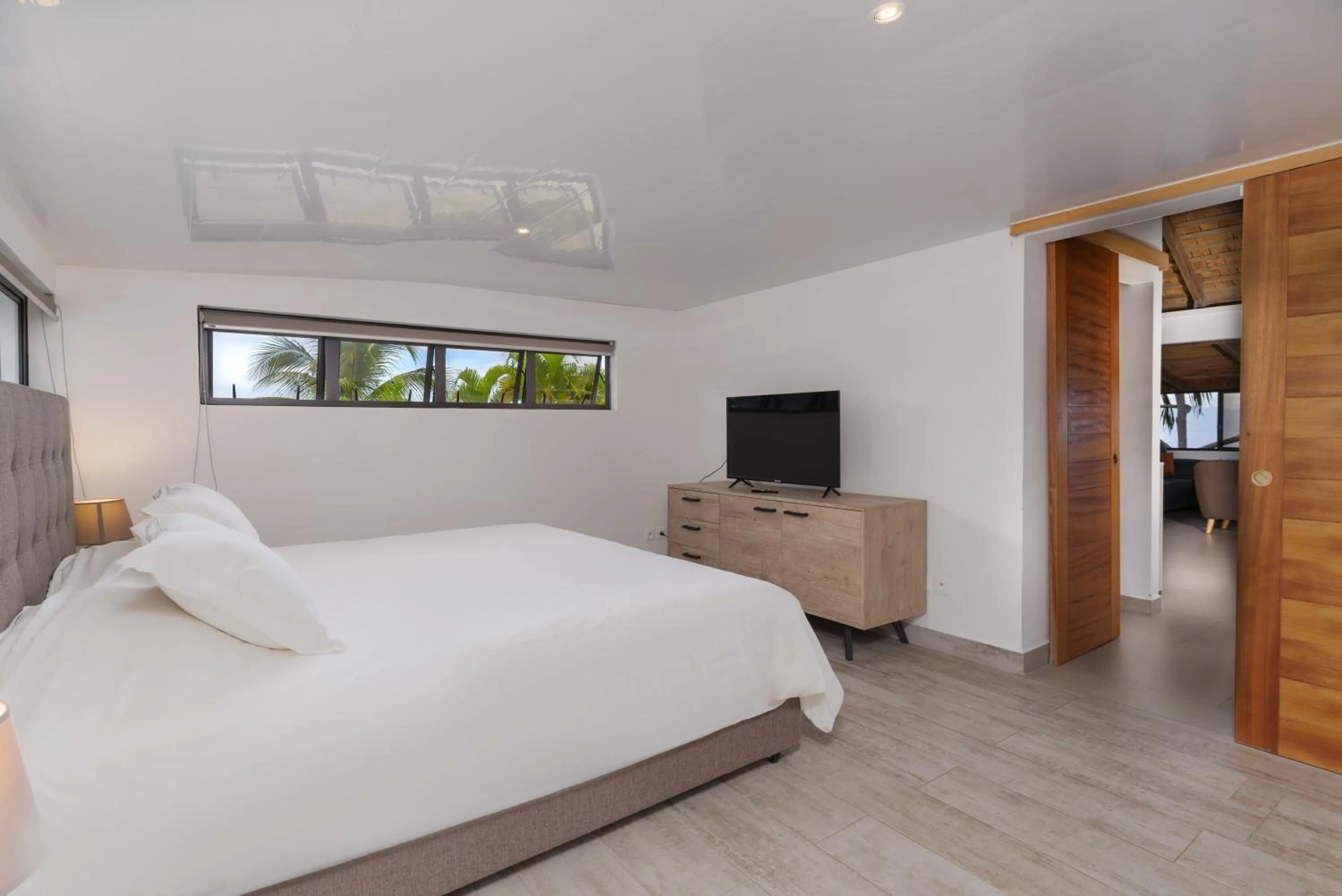 Bed in Jolie Maison Vue Ocean et Moorea