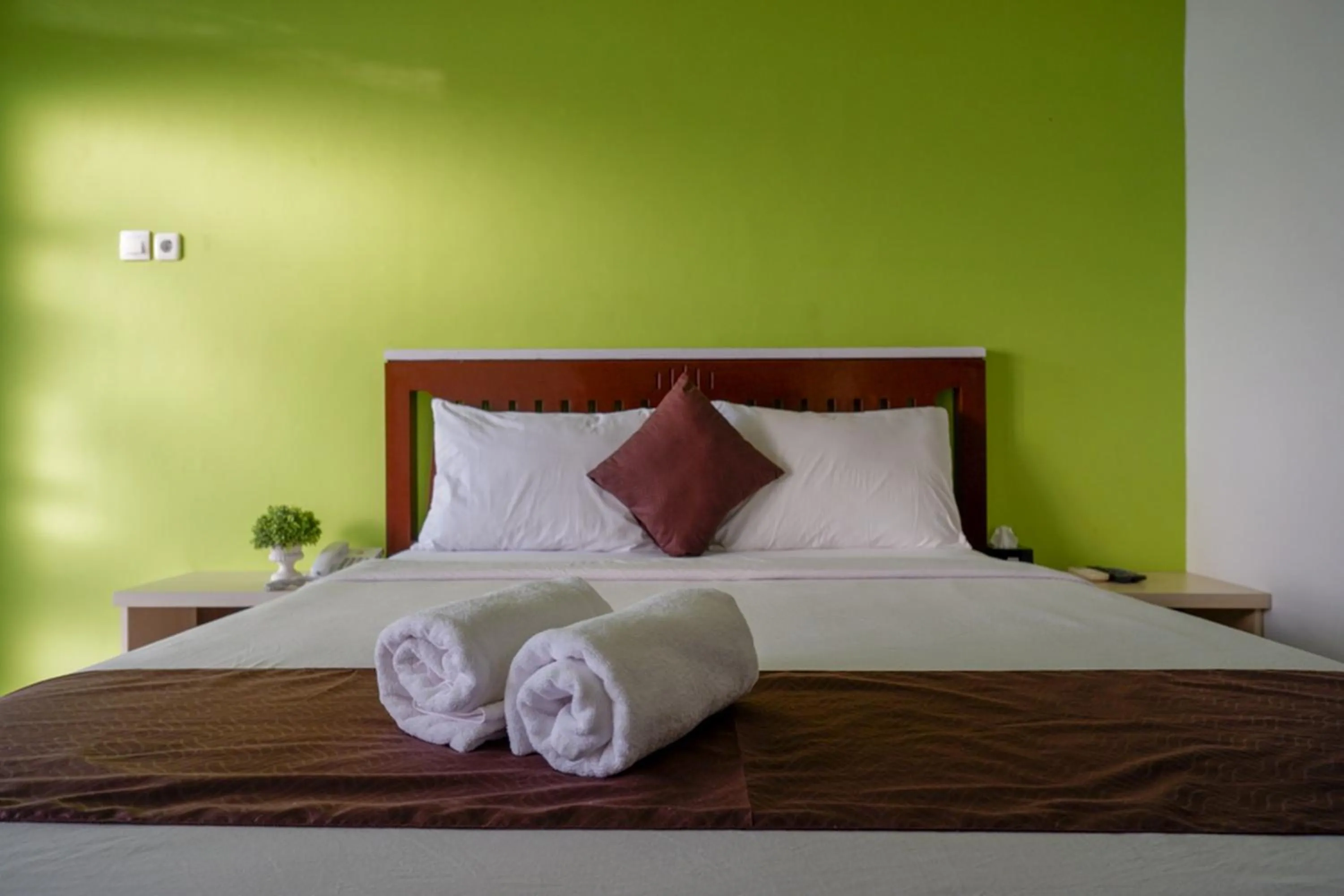 Bed in RedDoorz Syariah at Omah Sawah