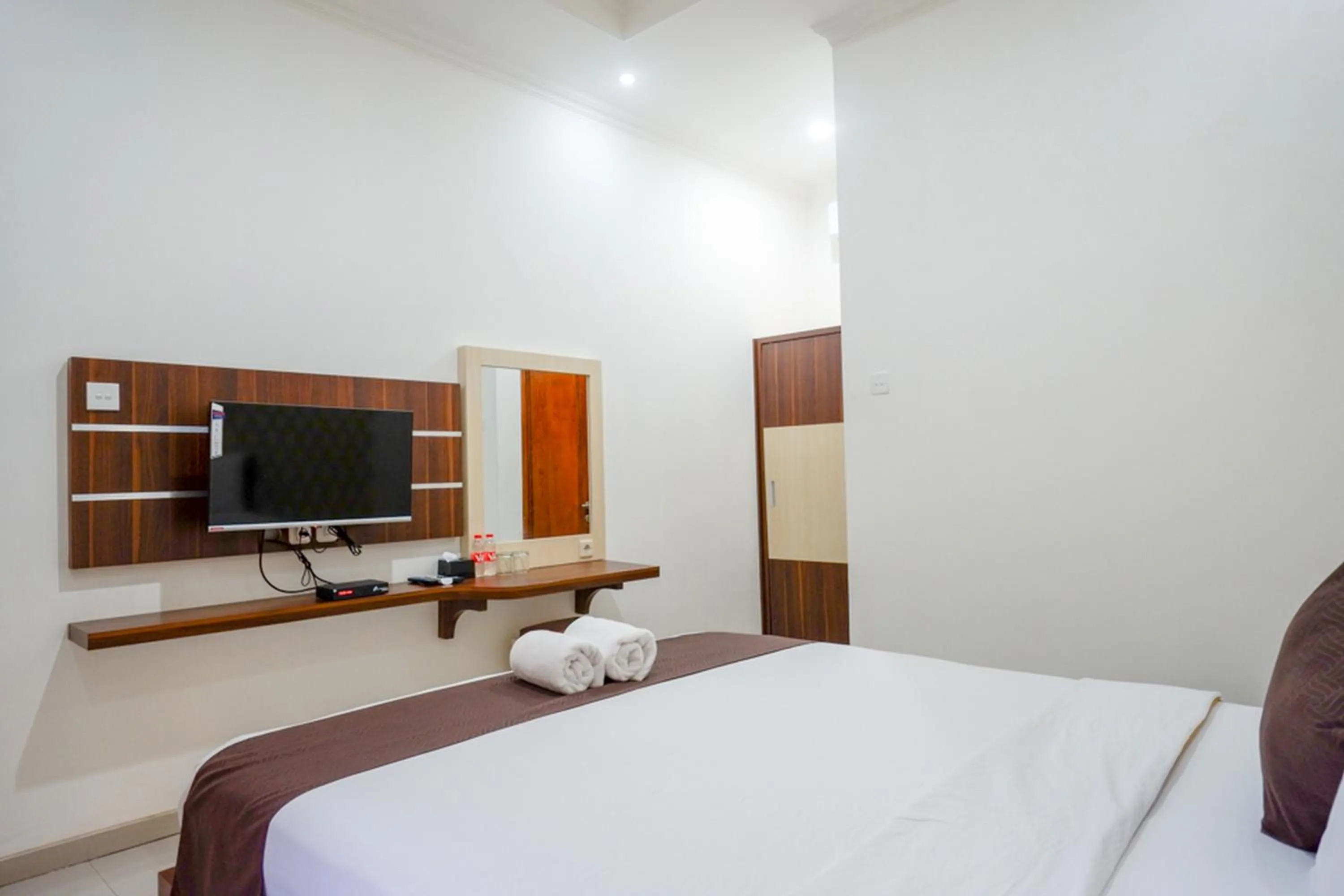 Bed in RedDoorz Syariah at Omah Sawah