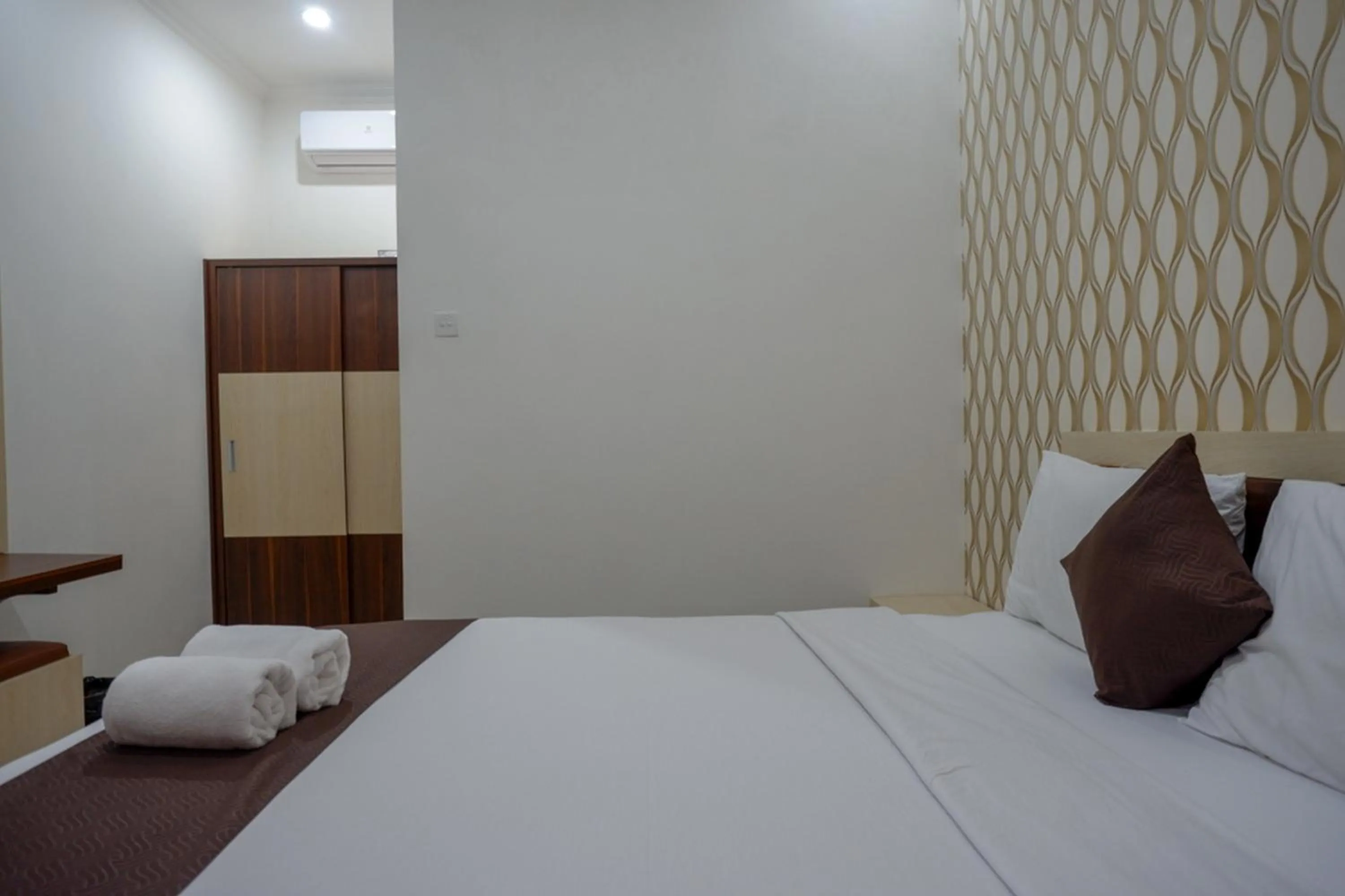 Bed in RedDoorz Syariah at Omah Sawah