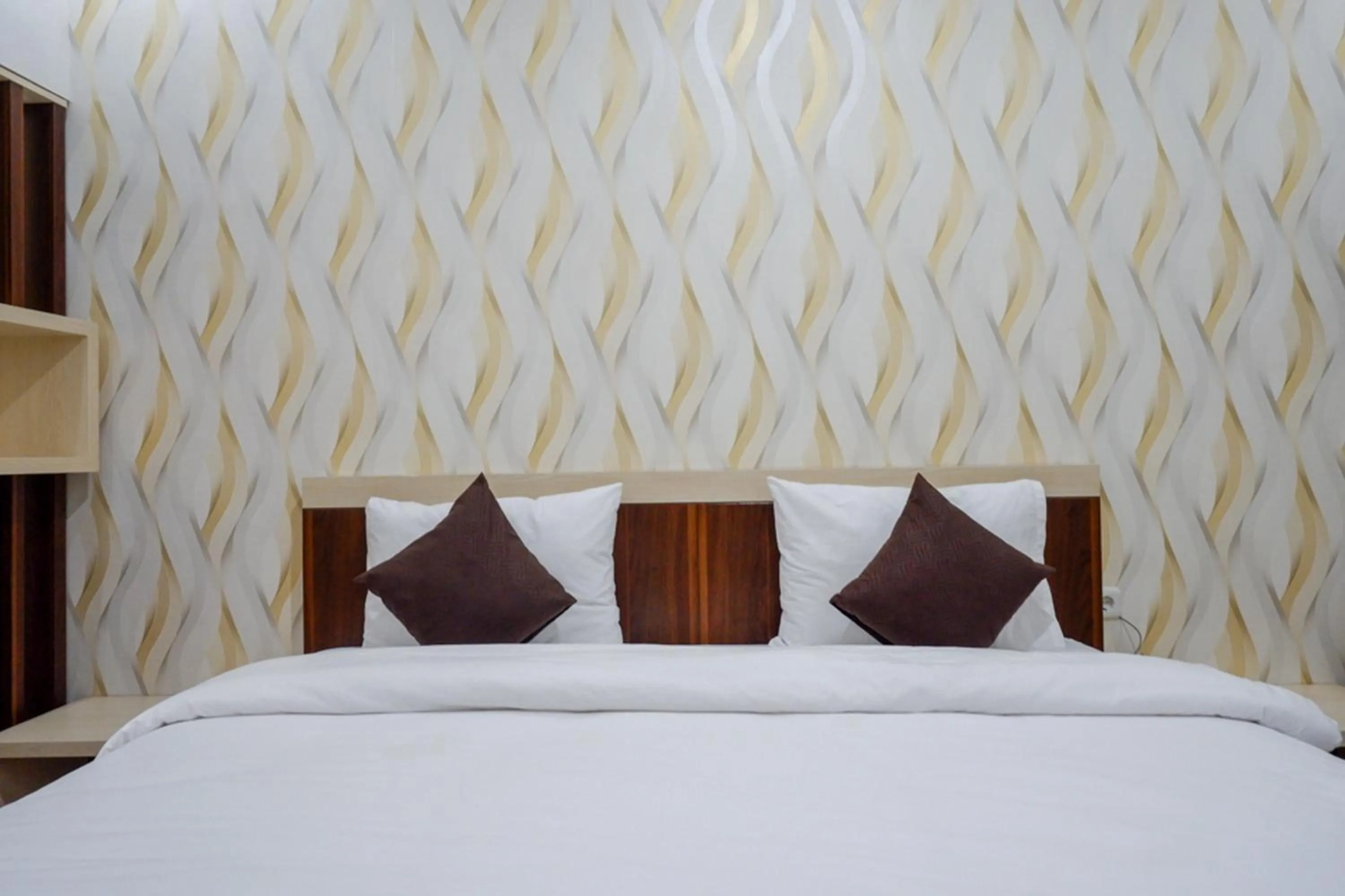 Bed in RedDoorz Syariah at Omah Sawah