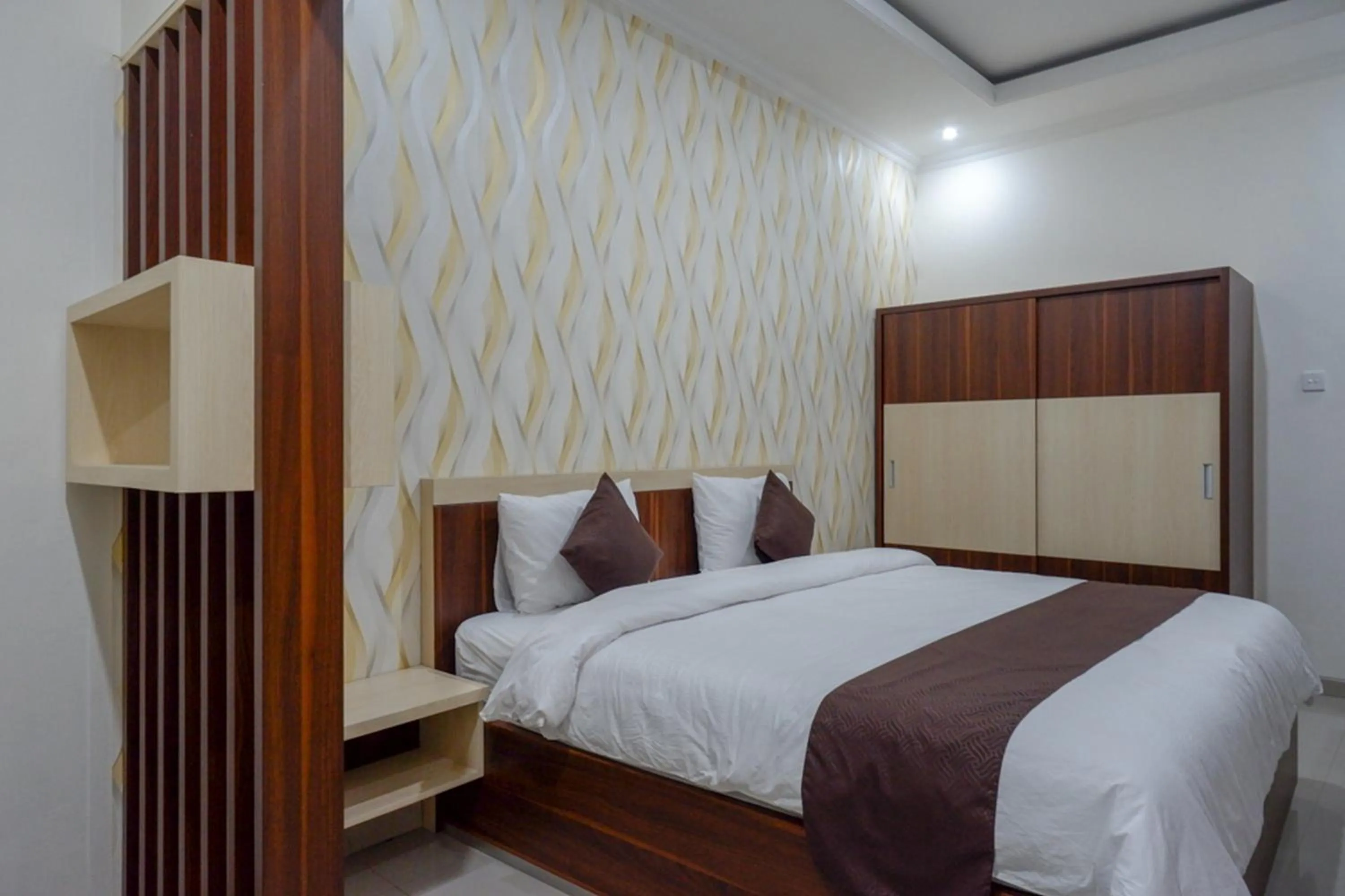 Bed in RedDoorz Syariah at Omah Sawah