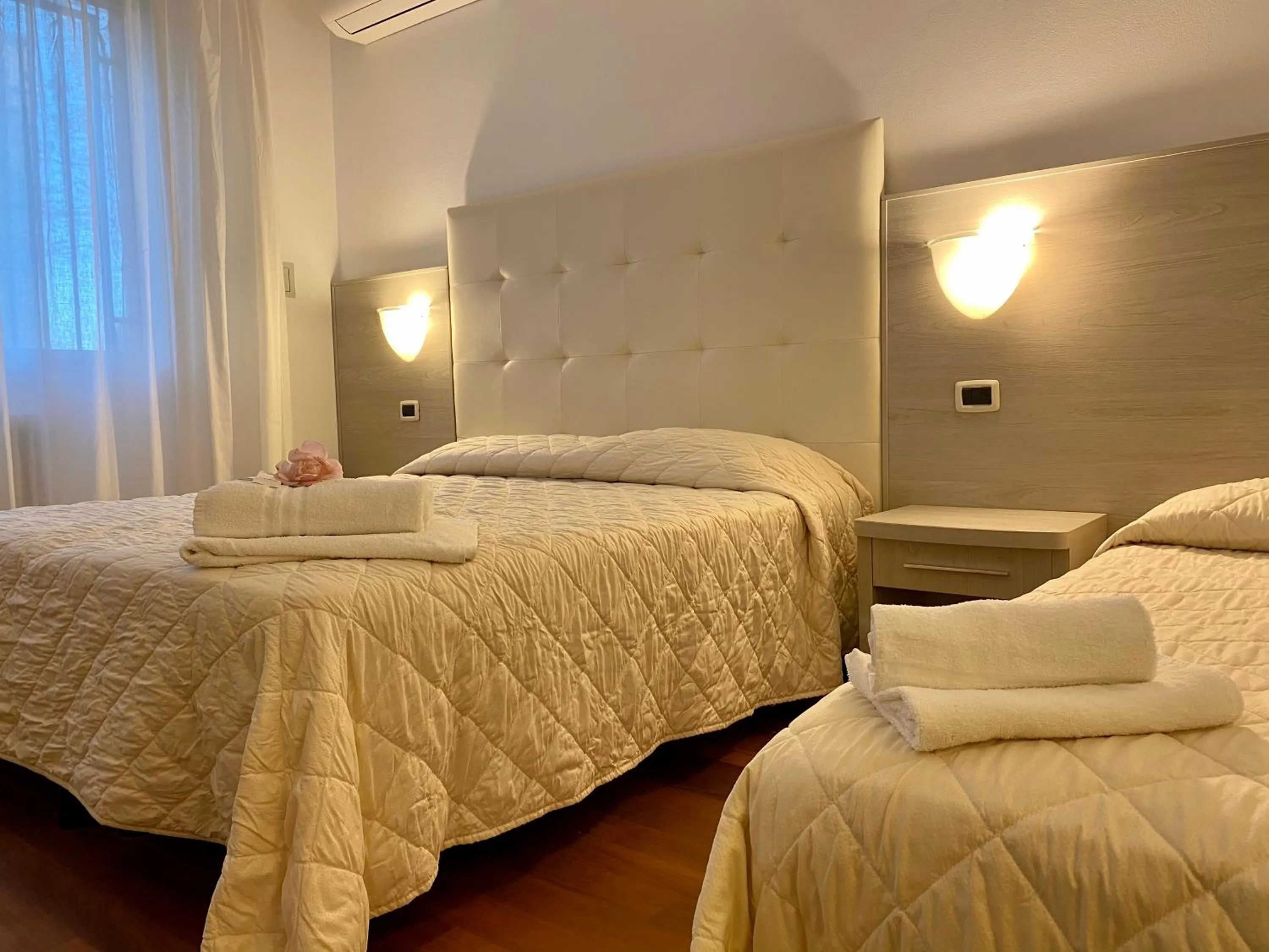 Bed in Villa Alda Suites & Rooms