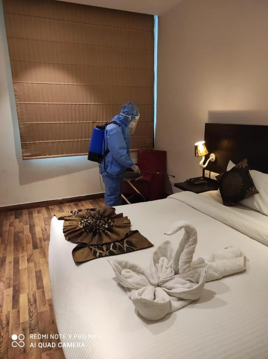 Bed in Joy Inn & Suites