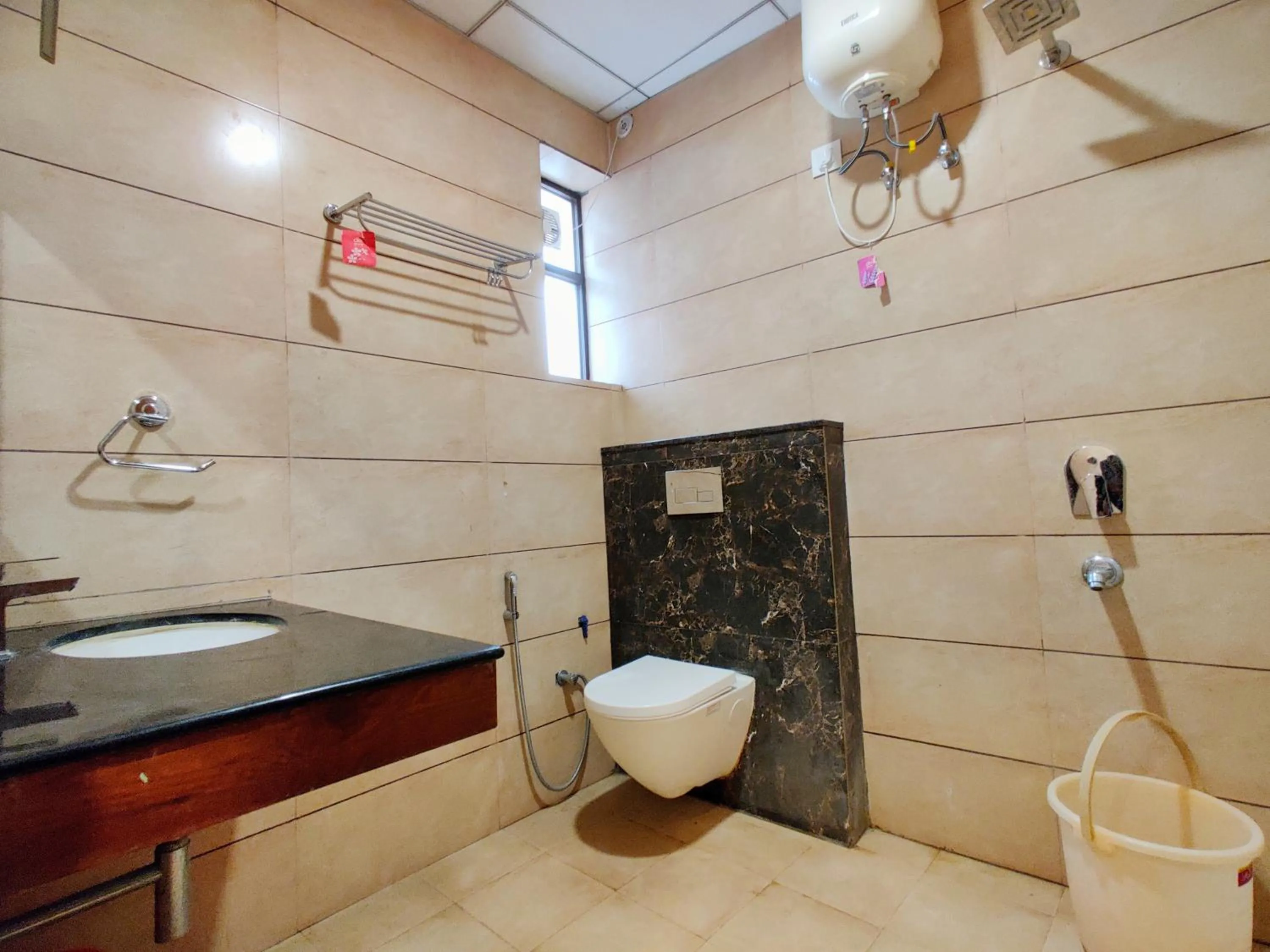 Bathroom in Hotel Divine Residency