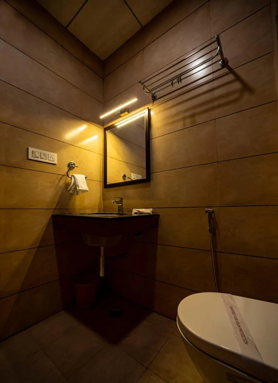 Bathroom in Hotel Divine Residency