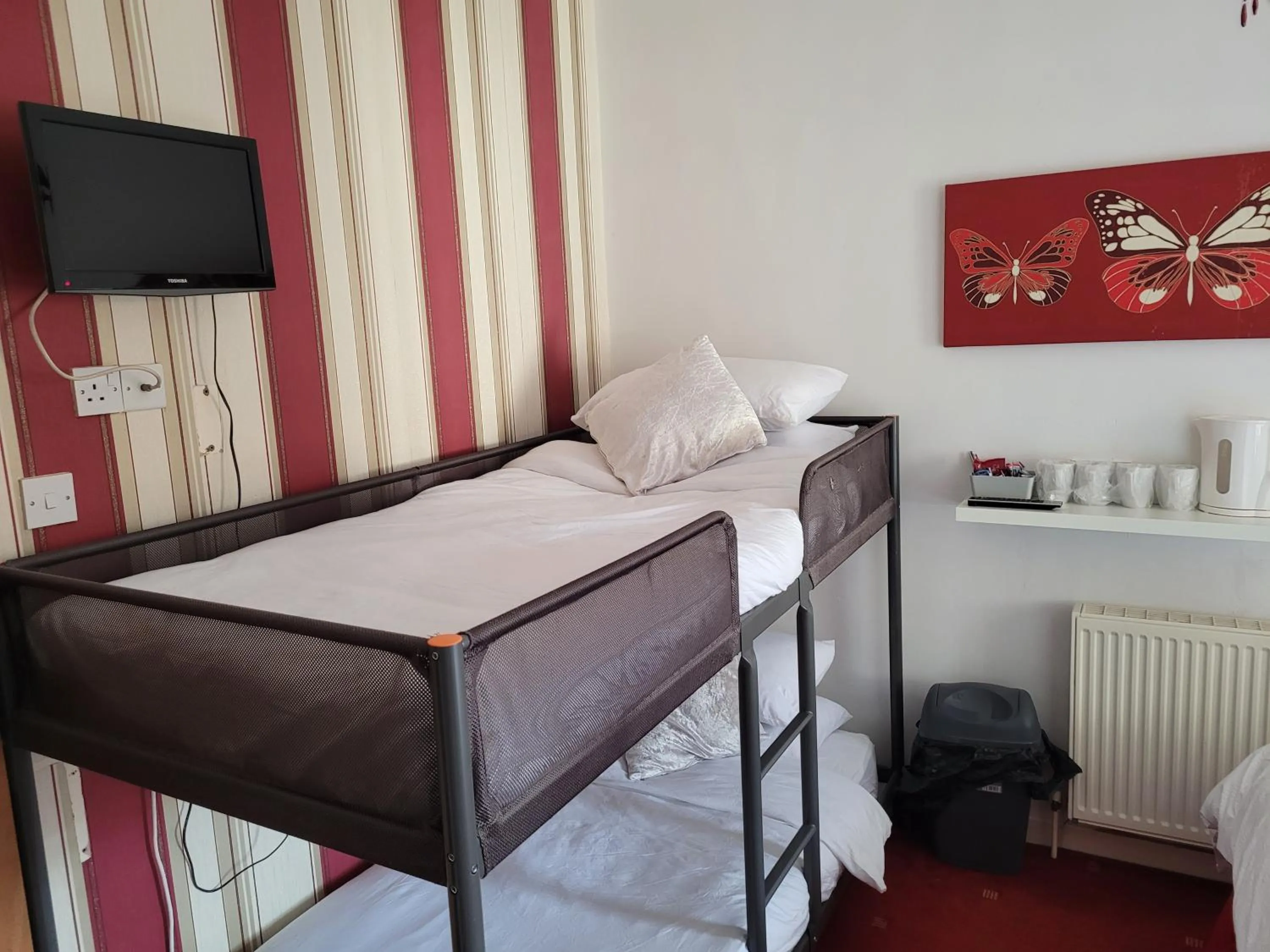 Bed in Tamarind Cove & Barrons Hotel