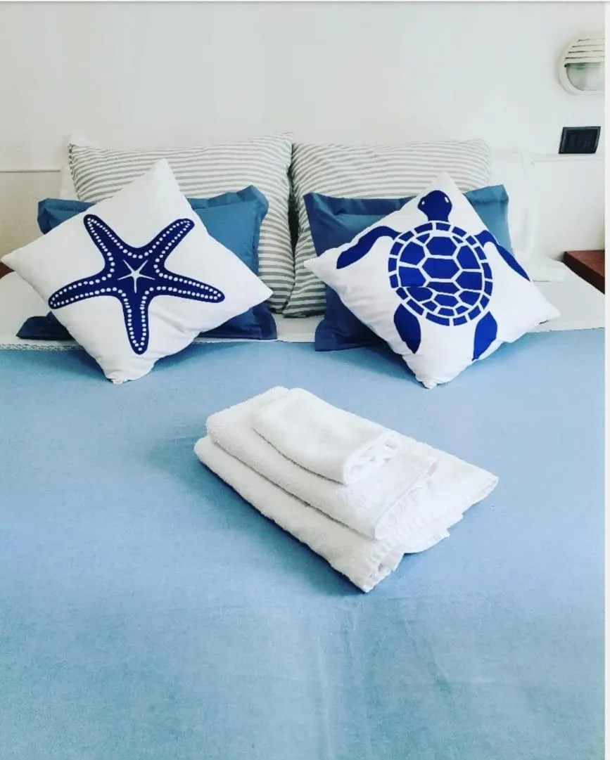 Bed in hotel colibri