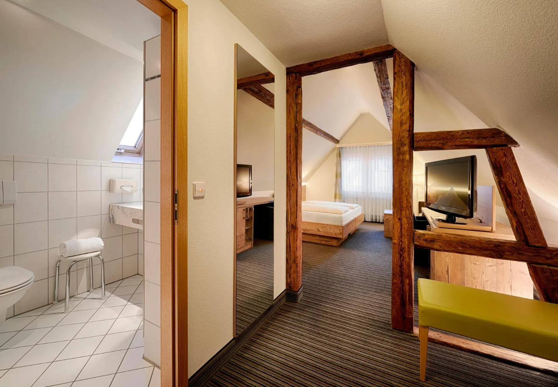 Bathroom, Bed in Hotel Kronelamm im Schwarzwald