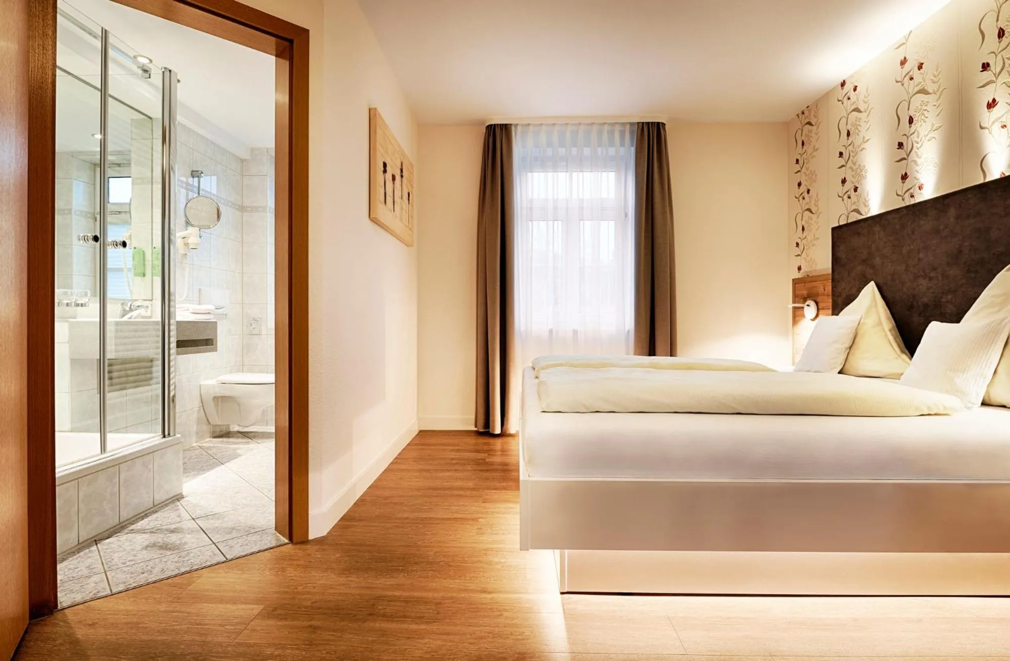 Photo of the whole room, Bed in Hotel Kronelamm im Schwarzwald