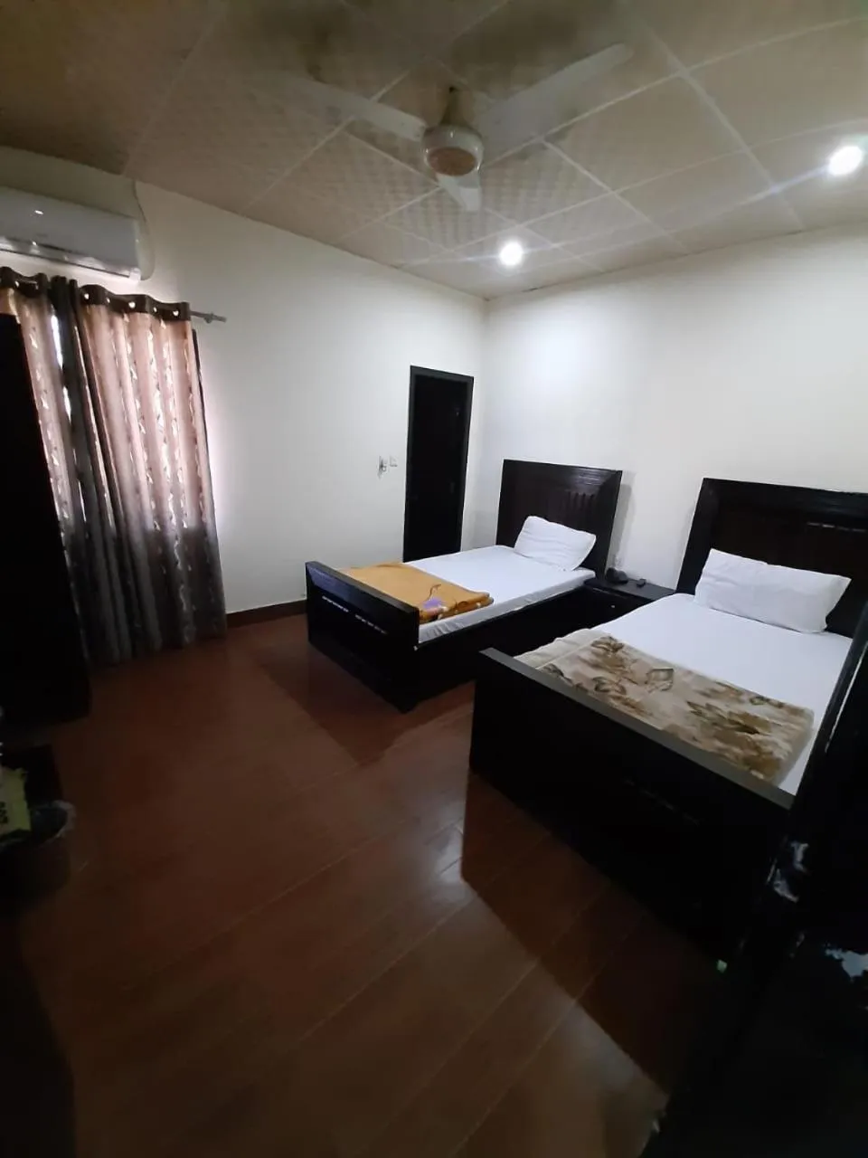 Photo of the whole room, Bed in Hotels Inn Multan Laxen Inn Multan Hotels Pakistan