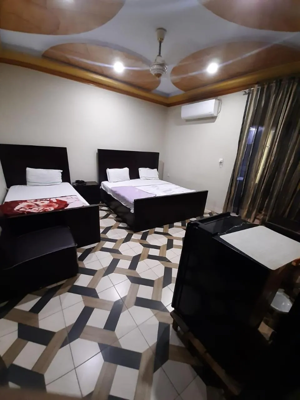 Photo of the whole room, Bed in Hotels Inn Multan Laxen Inn Multan Hotels Pakistan
