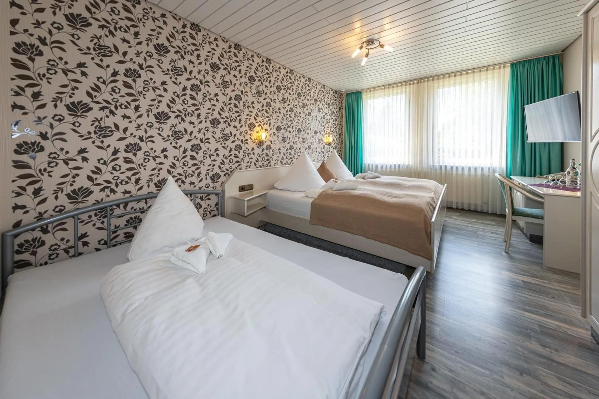 Photo of the whole room, Bed in Landhotel Zum Niestetal