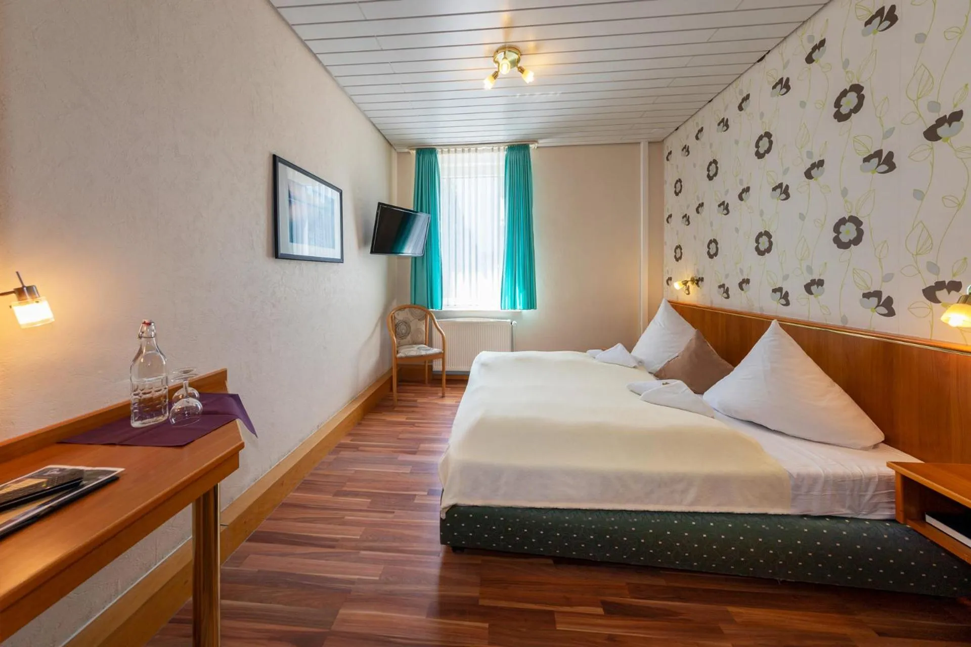 Photo of the whole room, Bed in Landhotel Zum Niestetal