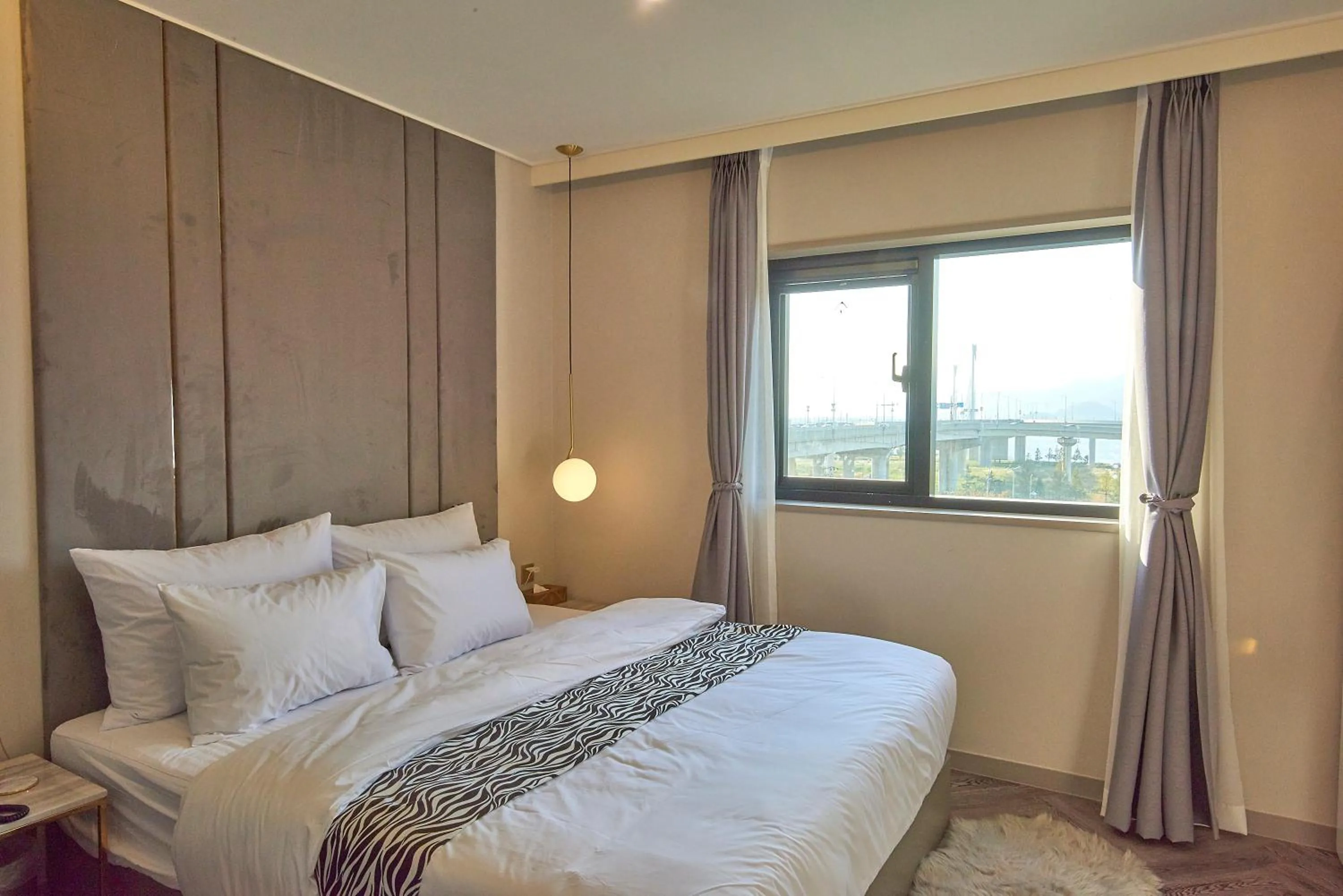 Bed in Denbasta Hotel