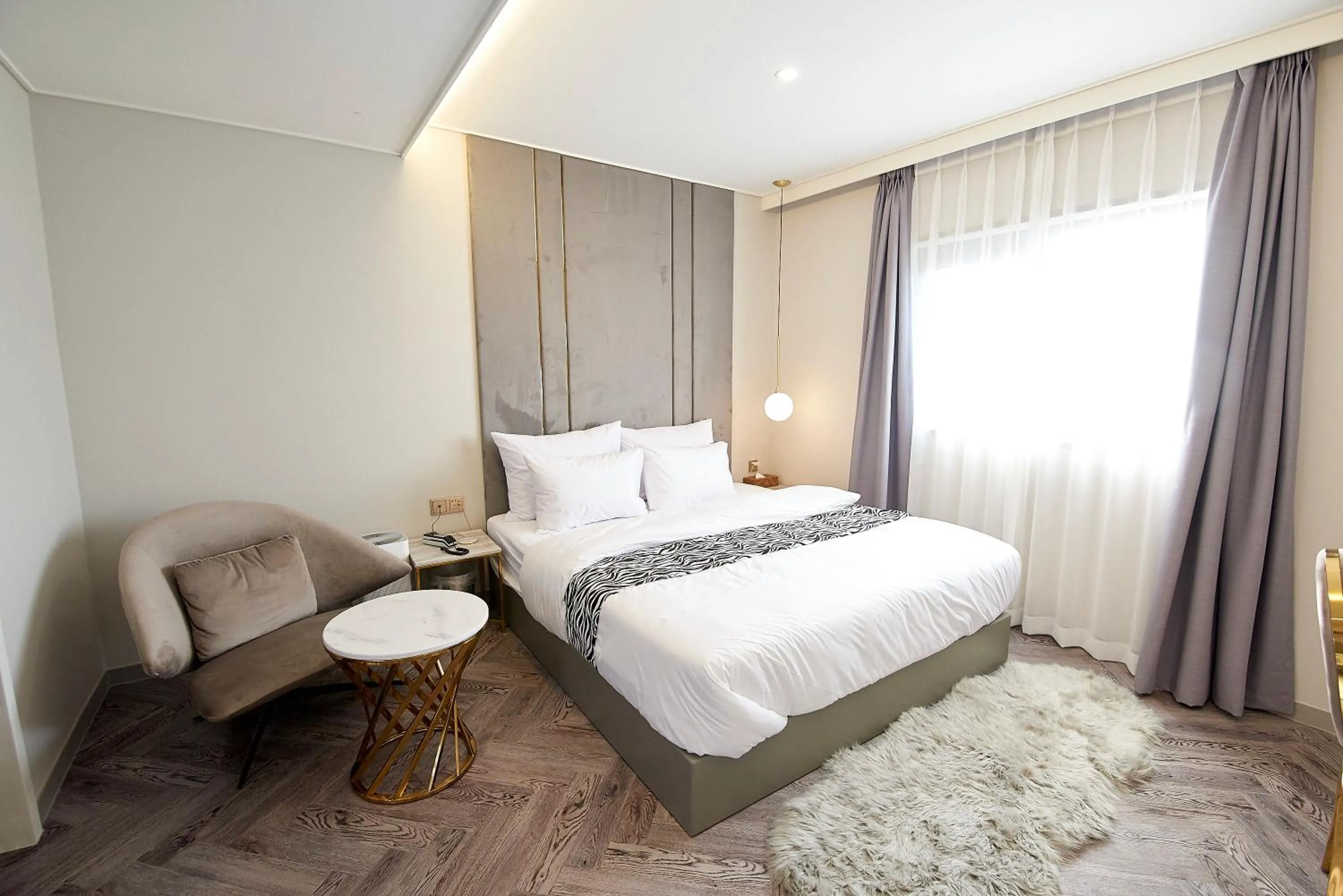 Bed in Denbasta Hotel