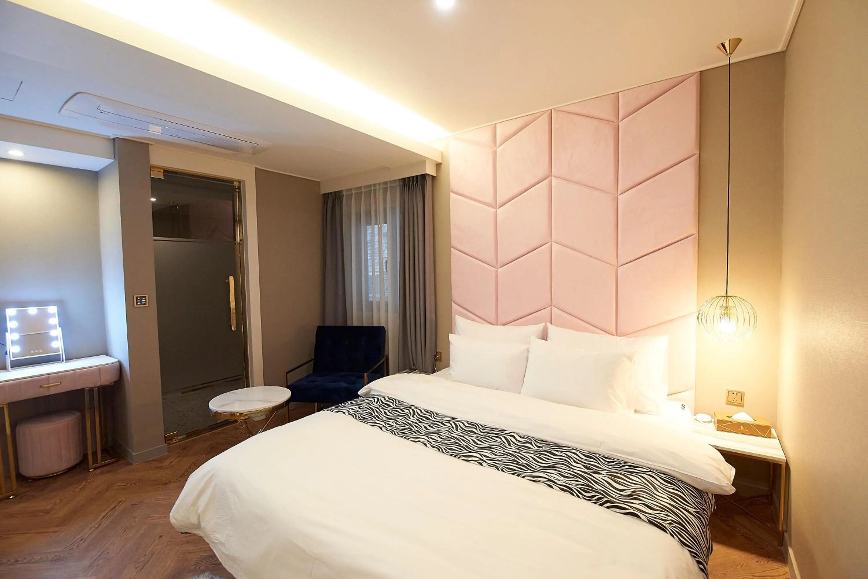 Bed in Denbasta Hotel
