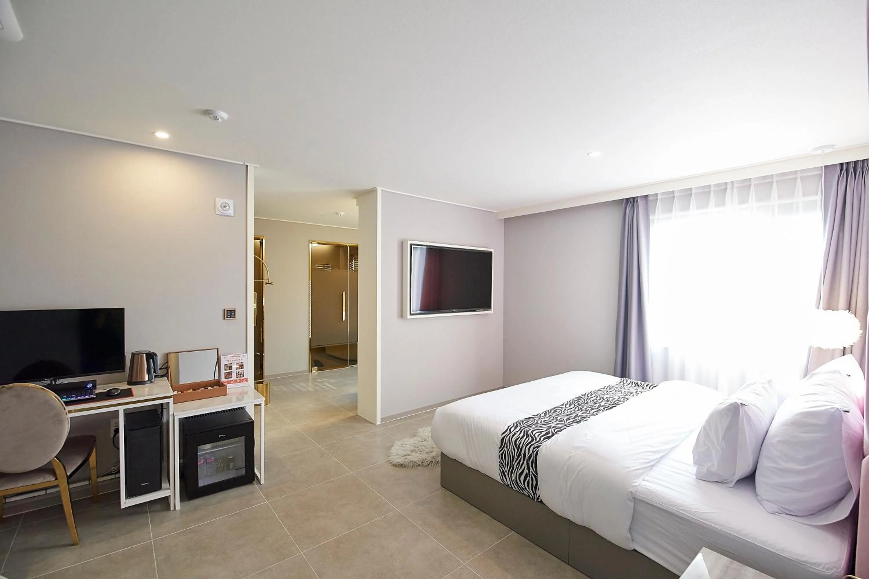Bed in Denbasta Hotel