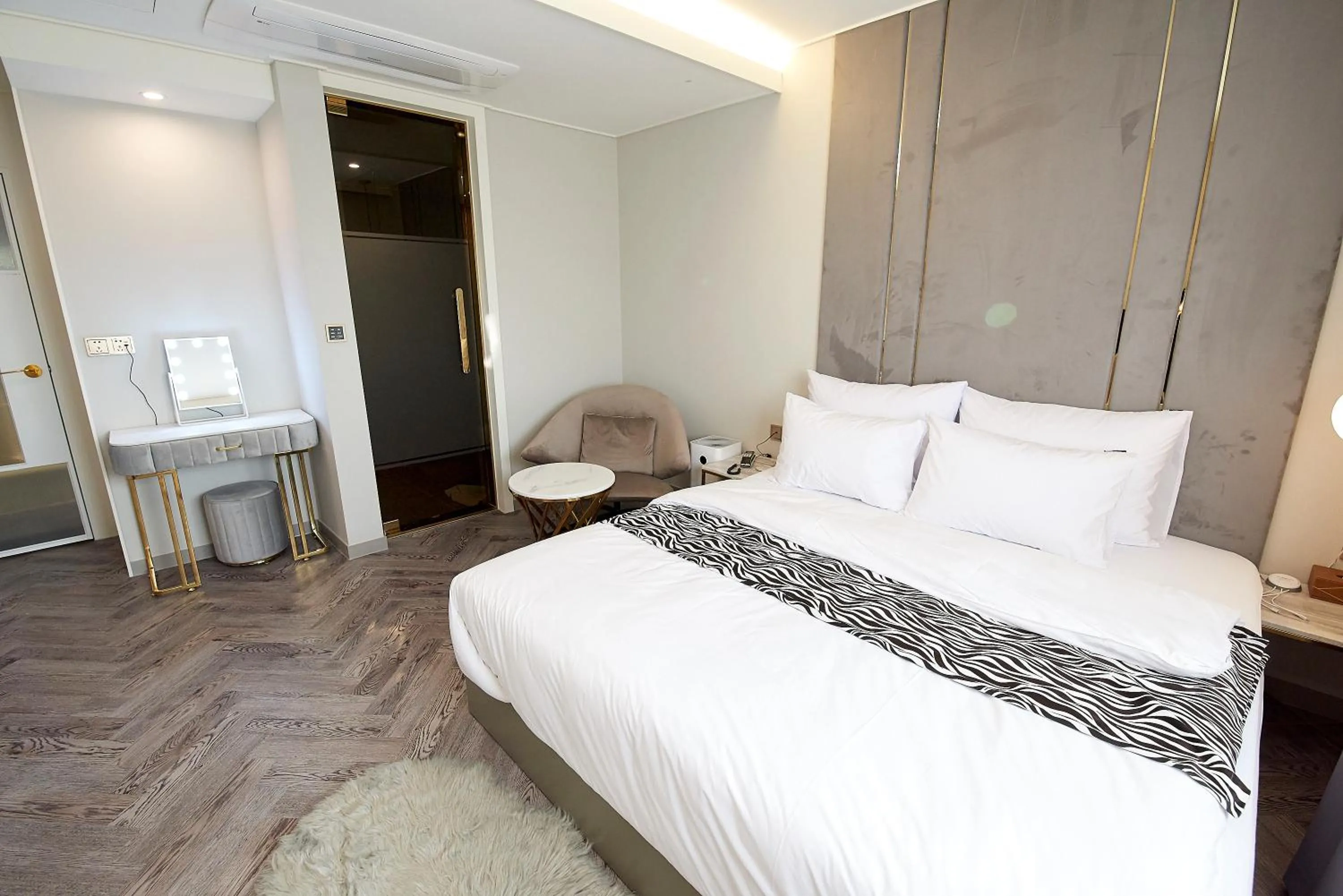 Bed in Denbasta Hotel